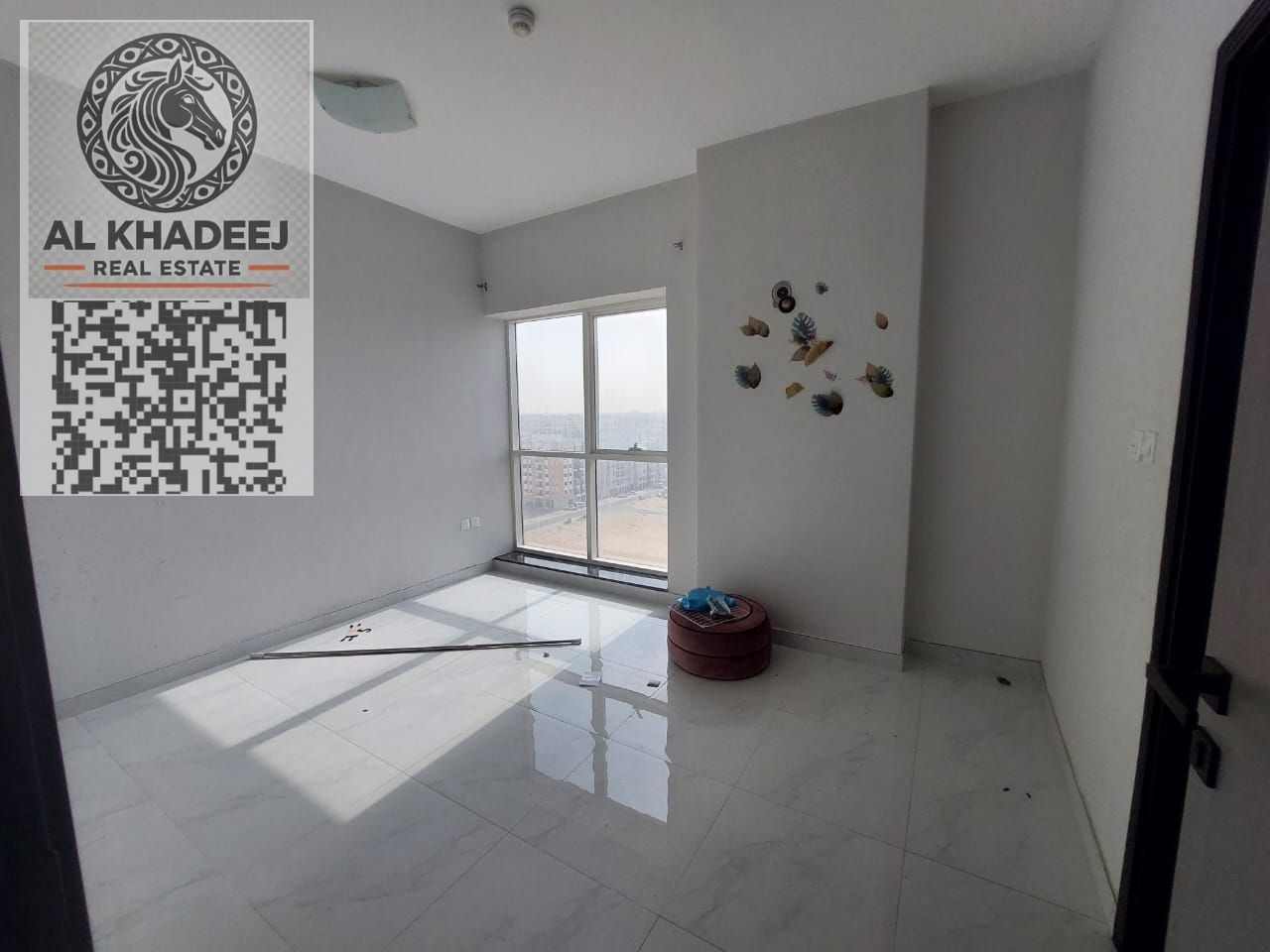 Two-bedroom apartment with a living room and an open view for annual rent – Al Jurf 3