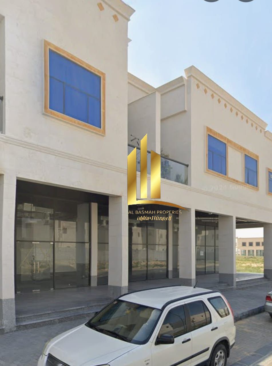 Building for sale in Al-Hawshi, first row, corner plot
