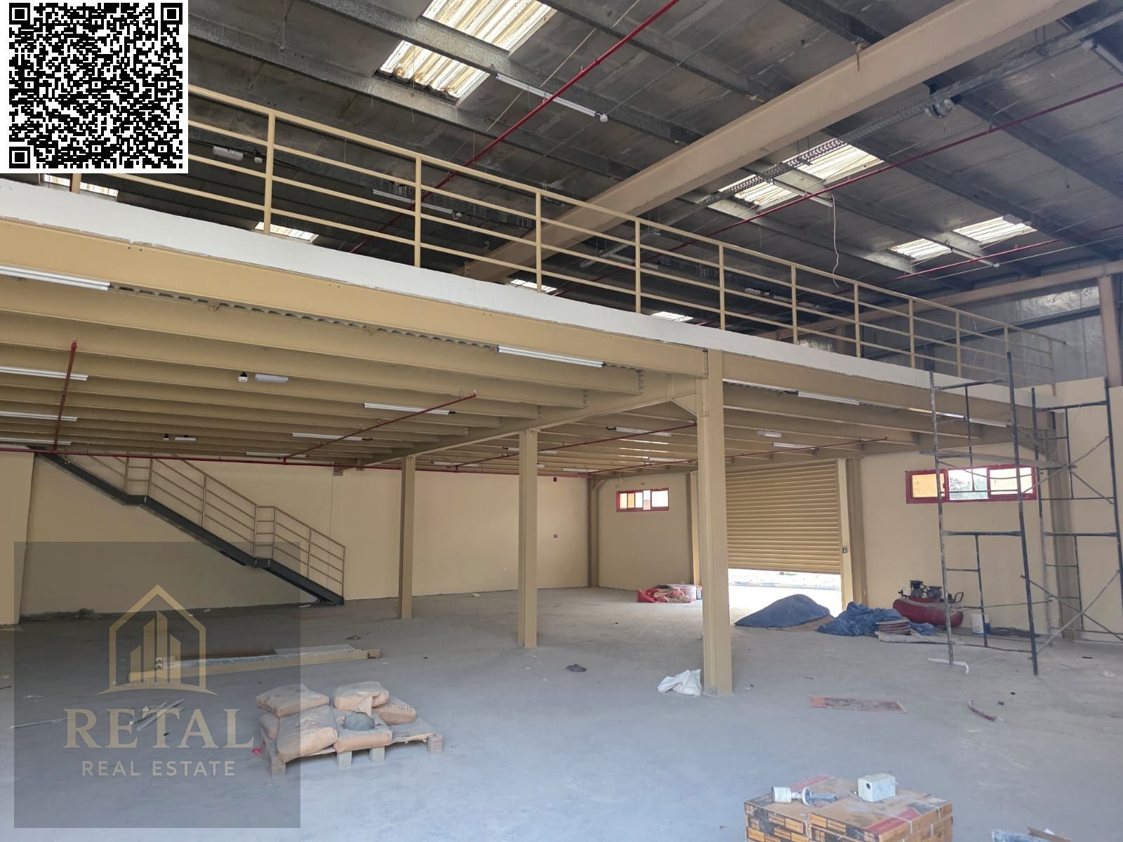 A warehouse with 2 doors on the main street, brand new and never used before.