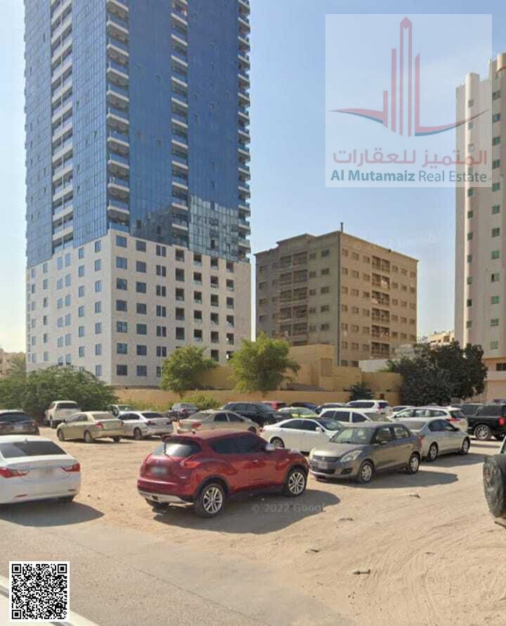 For sale in Ajman, Al Nuaimiya 3 land, residential/commercial, ground floor + 6 floors, area 10,000 sq ft, street and alley access, asking price 4 M