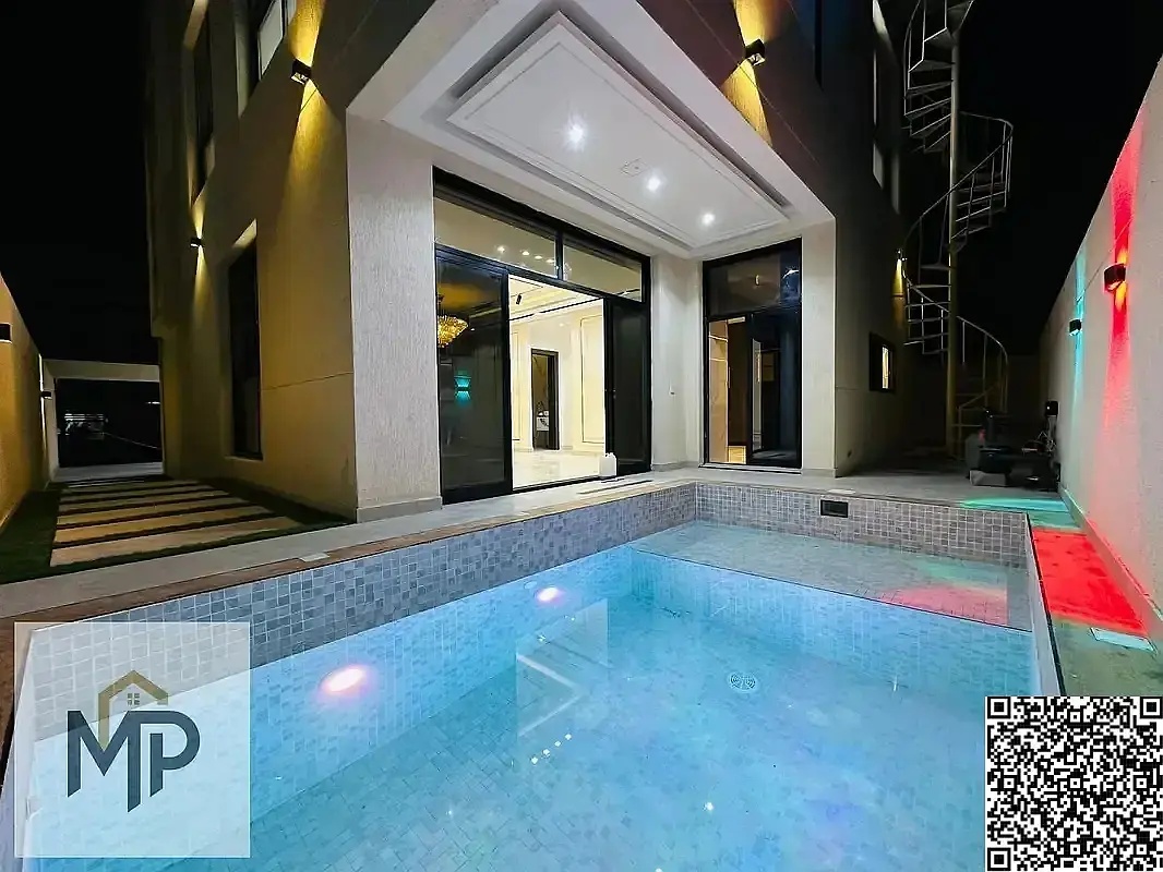 Own a villa with a private pool, including registration and ownership fees in Ajman, first occupant, with lifetime ownership and inheritance.