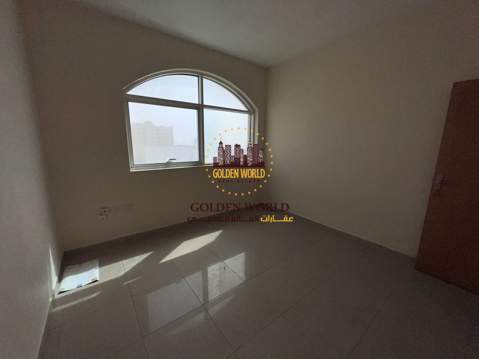 2BR apartment with living room, open panoramic view in Al Qasimia near Mega Mall, 2 bathrooms, parking, 2 months free, rent AED 40,000.