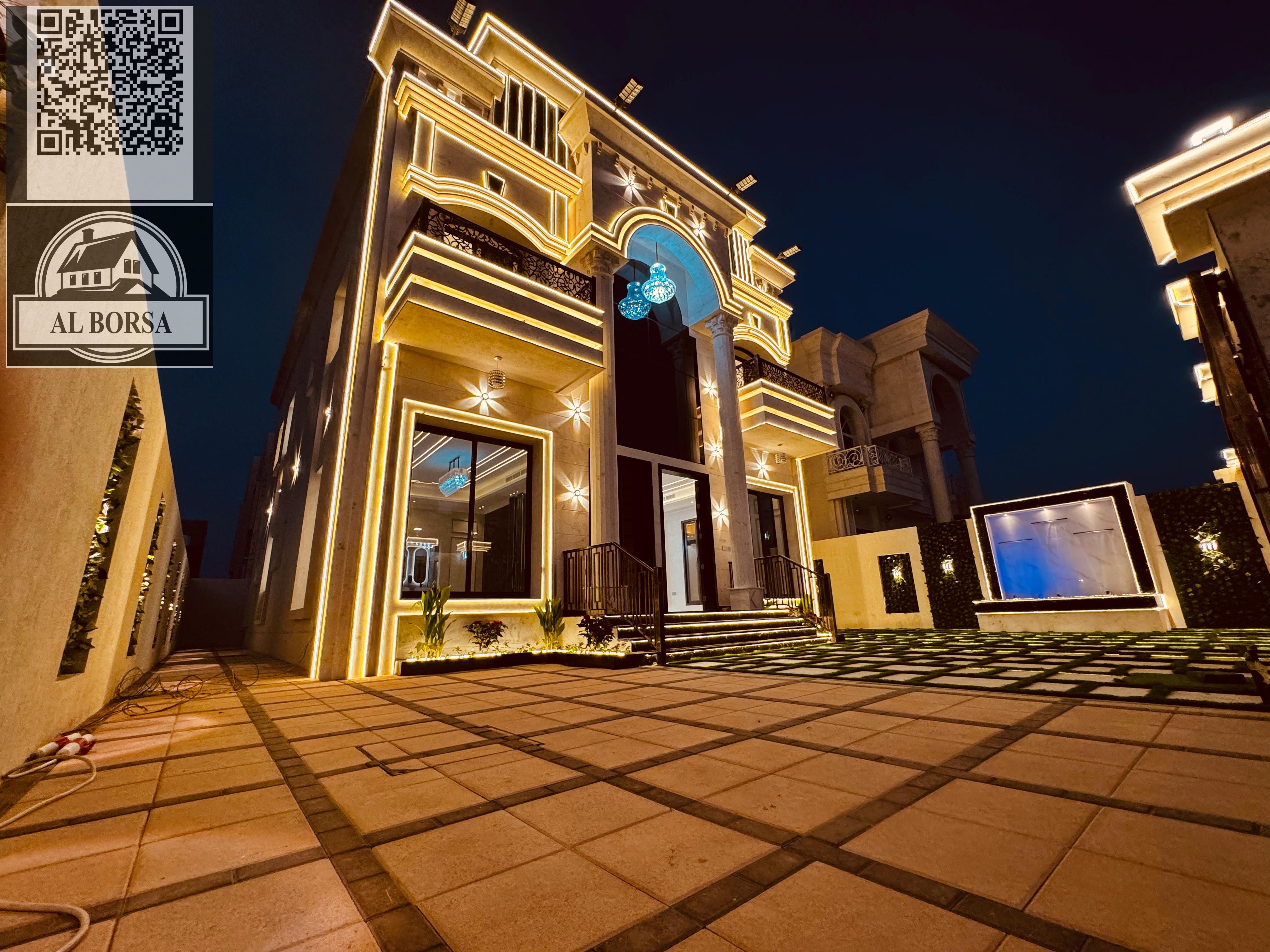 Villa for rent in Al Yasmin area, 5 master bedrooms, 2 living rooms, a majlis with a kitchen and a maid's room