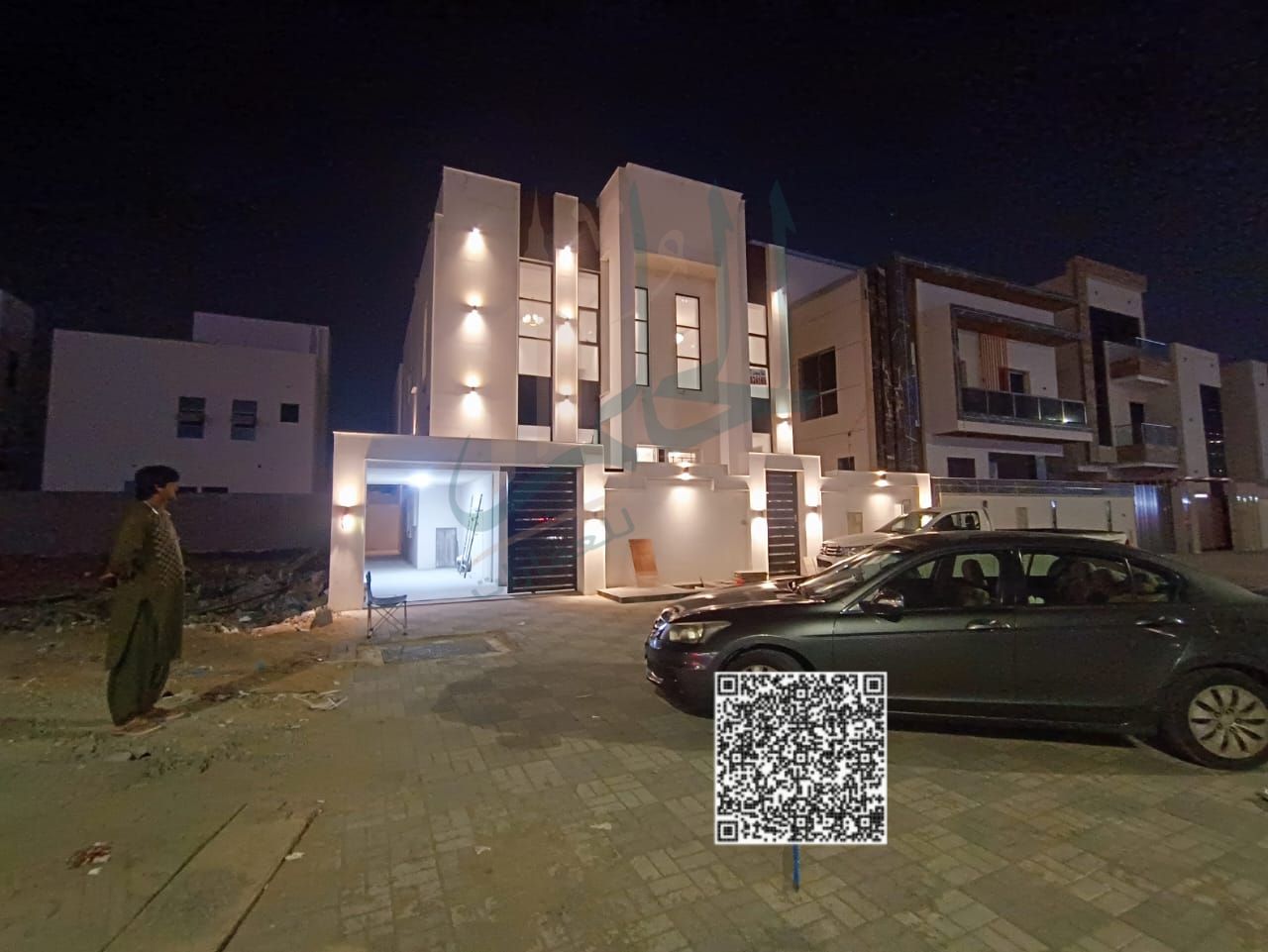 Spacious villa located on the service road in Al Helio 2, offering comfortable living spaces and a family-friendly environment.