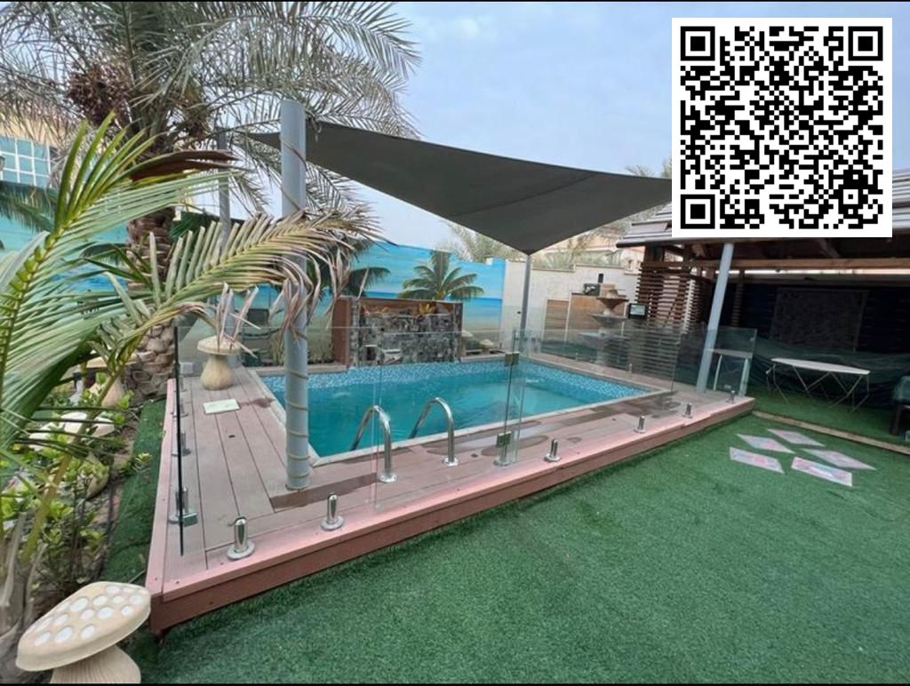 For sale: Residential investment villa in Al Rawda 3, excellent location opposite Ajman Health Center, corner plot on two paved streets, second plot f