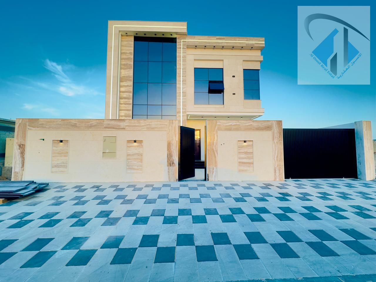 Villa for sale in Al Zahia area, Ajman. Modern design, located on a street and alley opposite a park. Brand new, first occupancy. Consists of 3 floors