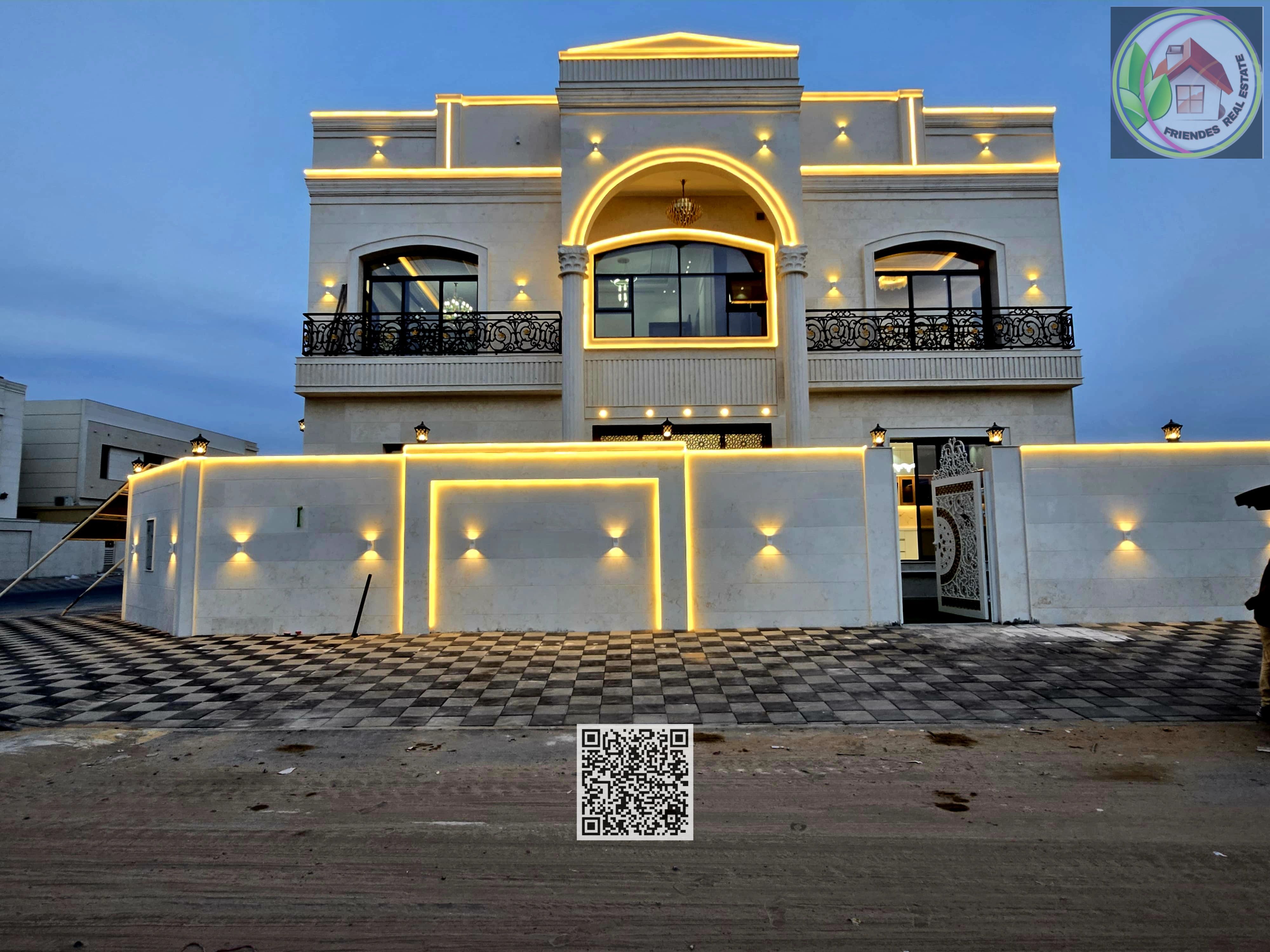 Stone villa directly opposite Al Hamidiya, central air conditioning, registration, electricity, and water included, freehold ownership, no fees.