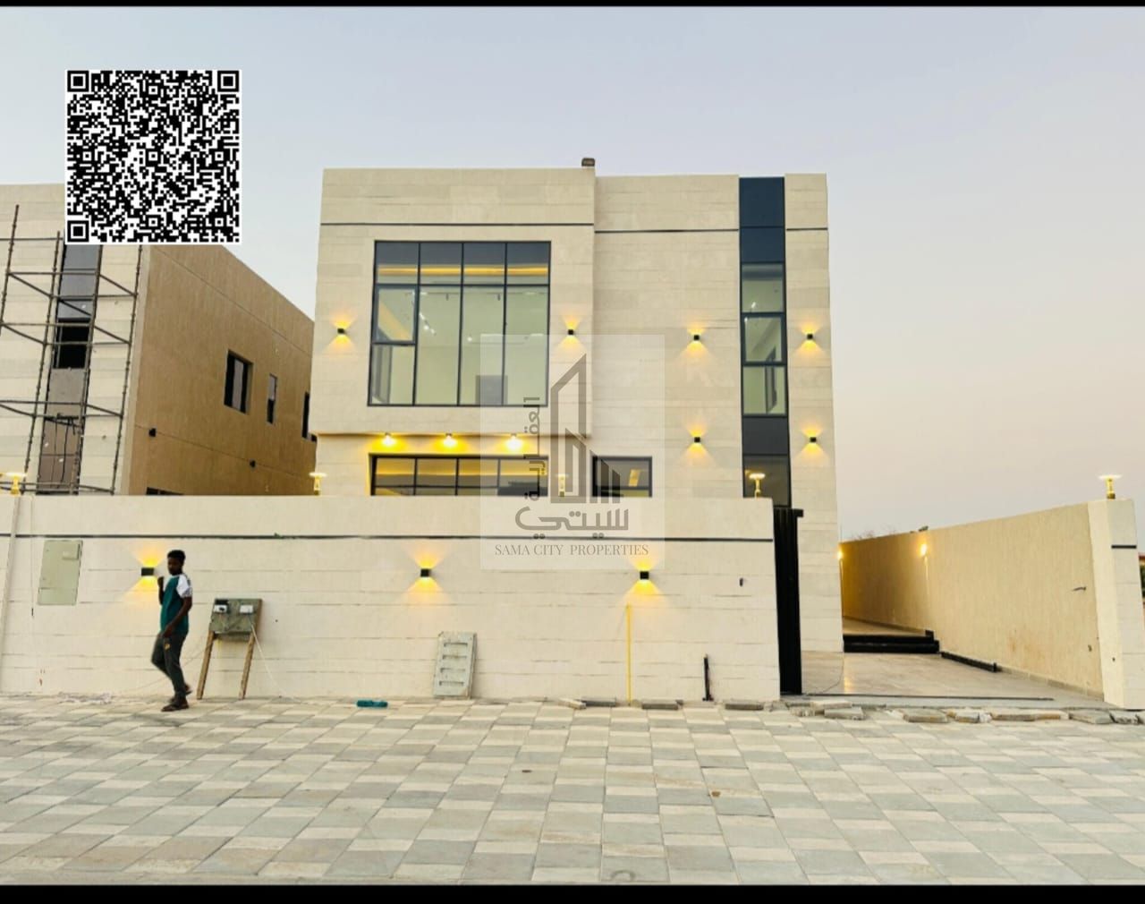 Two-story villa with a courtyard, rest area, and rooftop terrace, priced inclusive of registration and ownership fees, located on the main street, rea
