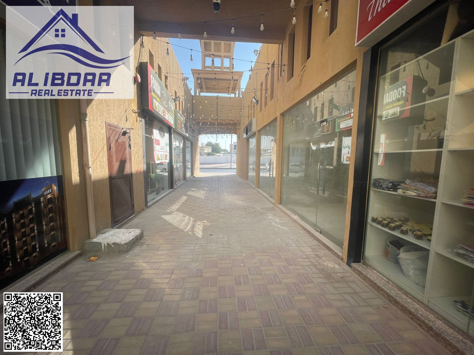 Commercial shops with mezzanine for rent in Ajman, Al Hamidiya area.