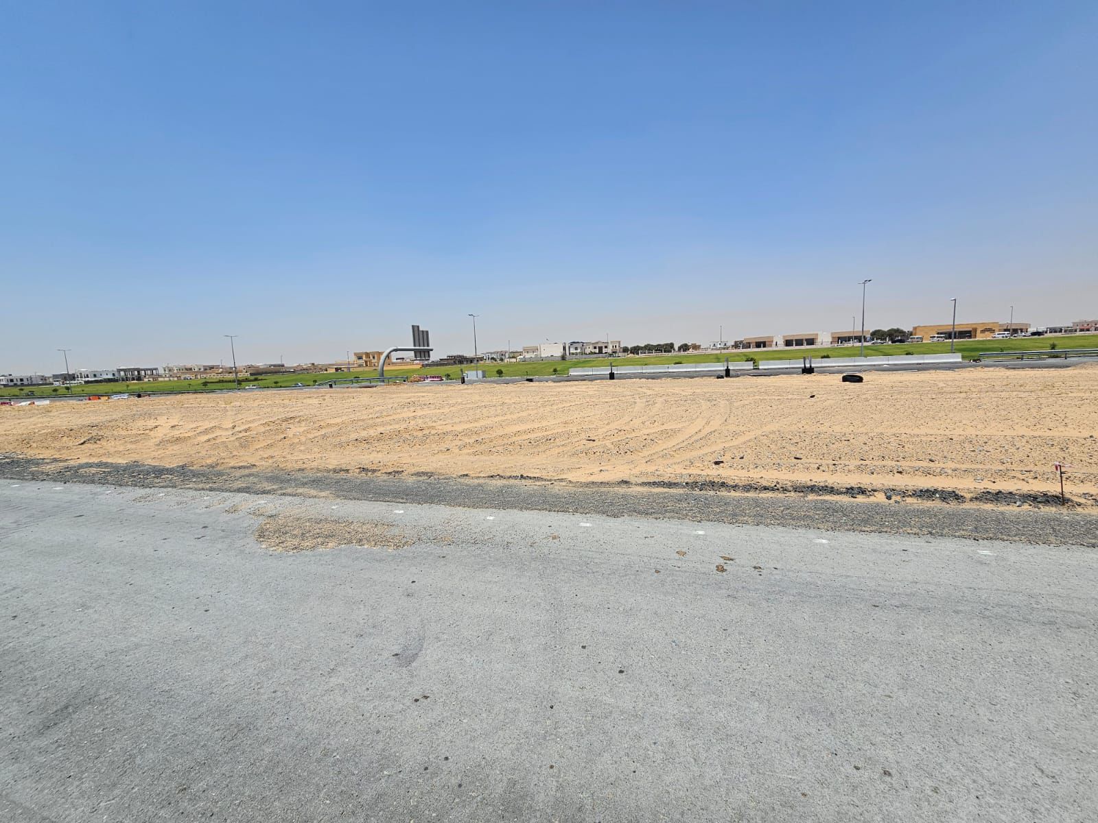 Land for sale in Tilal City opposite Masar Project