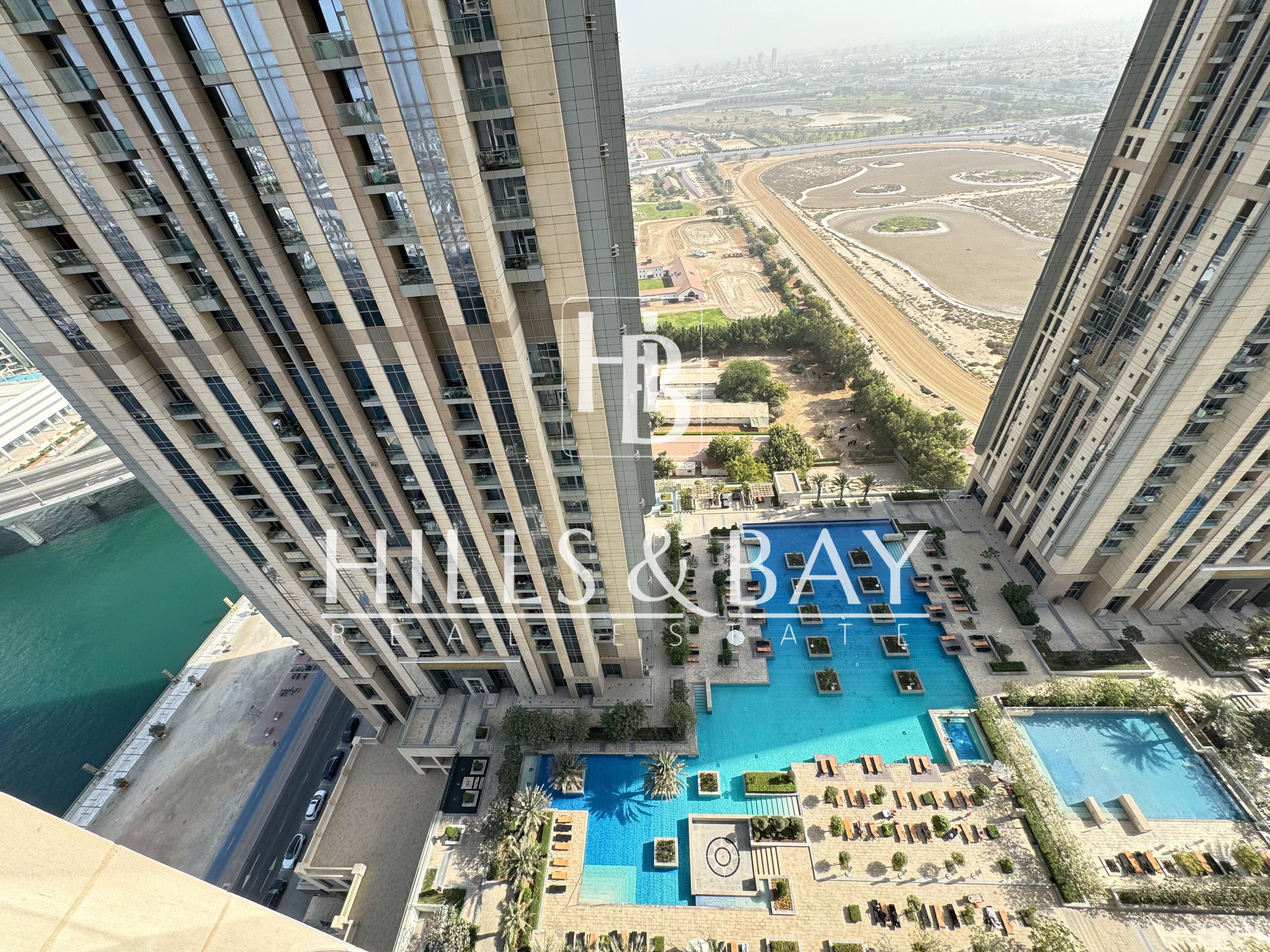 2BR | Unfurnished | Pool & Partial Canal View