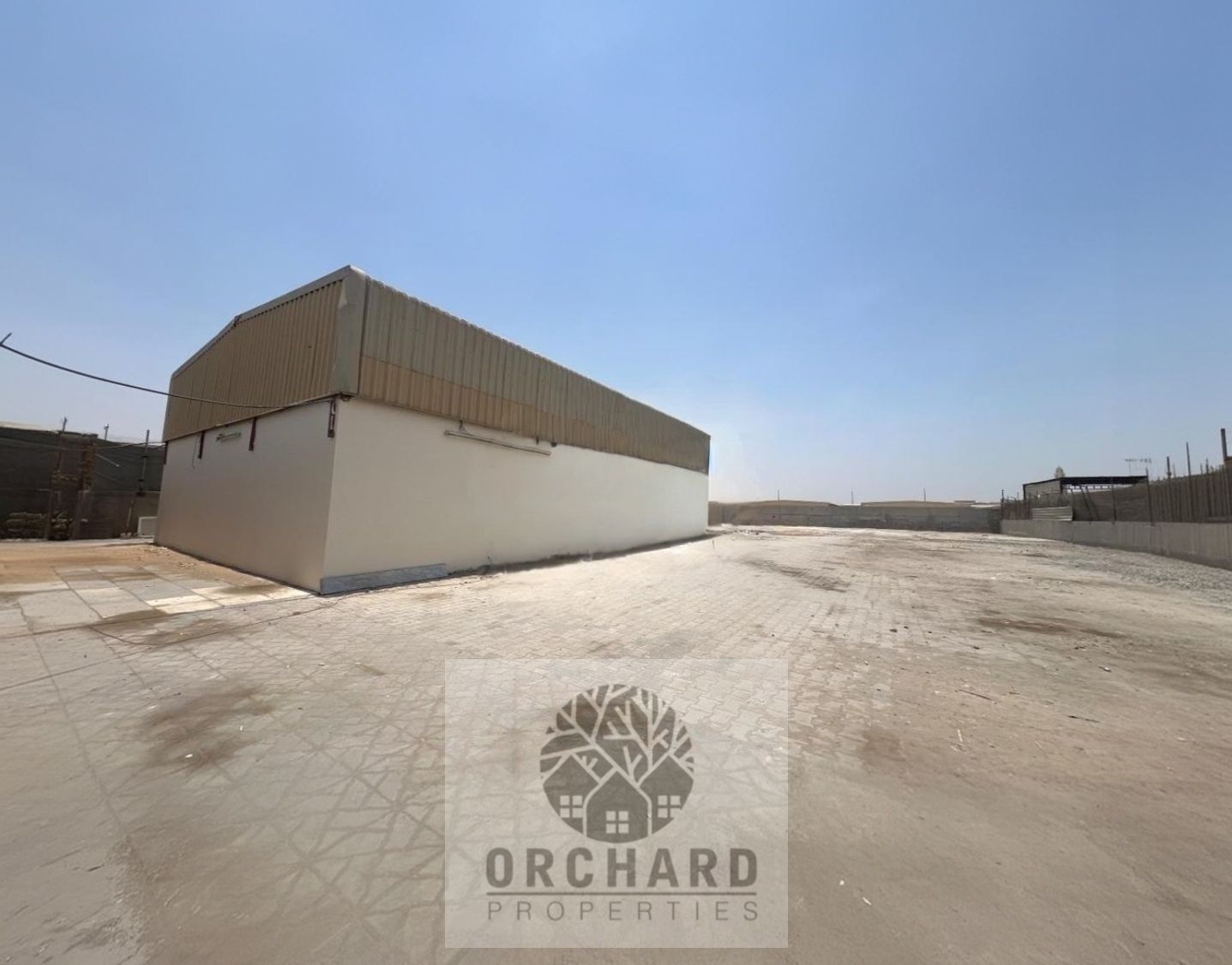10000 SQFT with interlock and shade/Heigh Electricity/Good location/Ready to move yard/Rent 150,000Dh