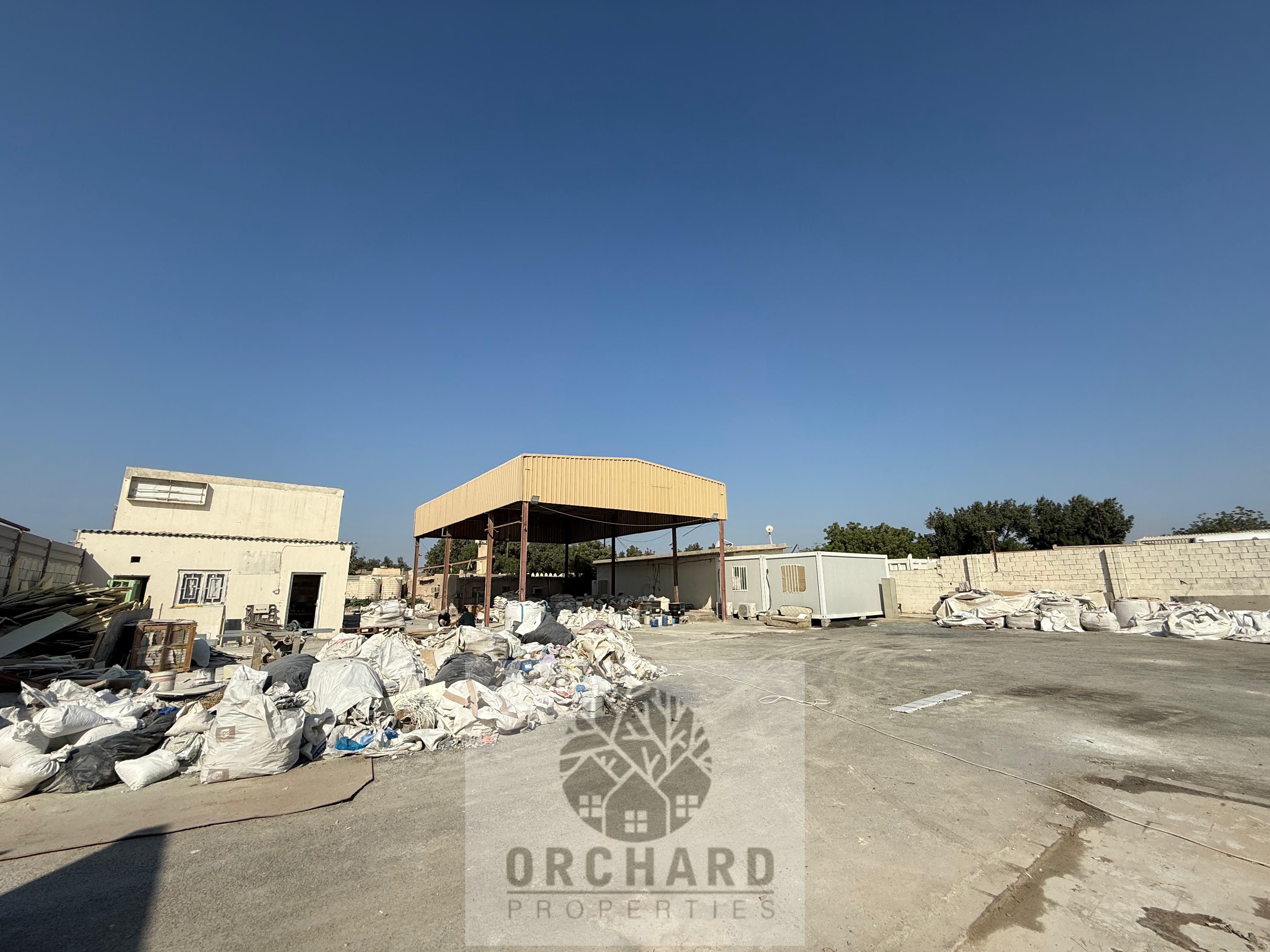 20000 SQFT OPEN YARD WITH SHED AND INTERLOCK/ELECTRICITY POWER HIGH/RENT 30000 AED
