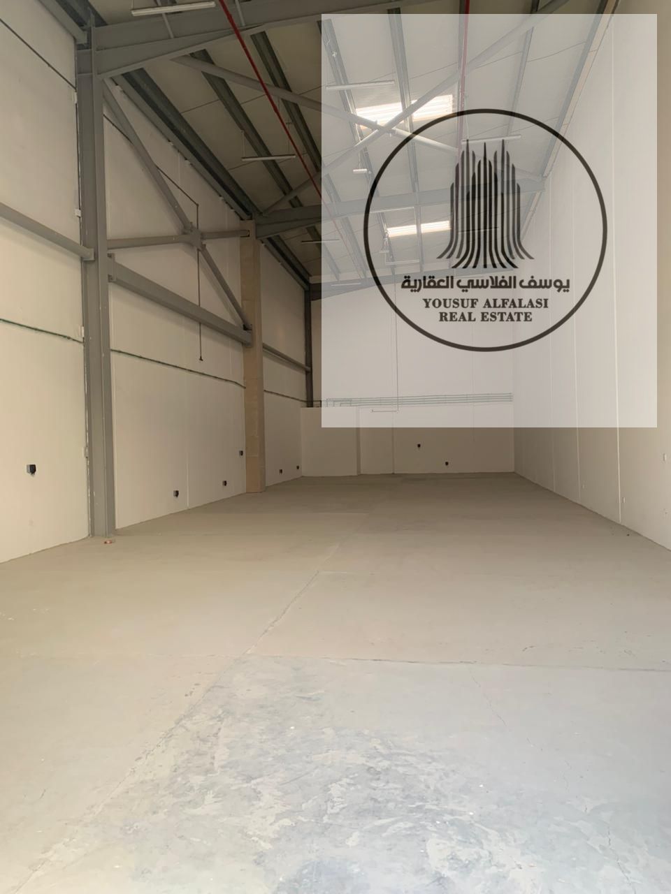 New warehouse for rent – first occupancy, 13m high, with strong electricity supply, in Ajman Industrial Area 1. Area: 3400 sq ft, electricity: 40 kW