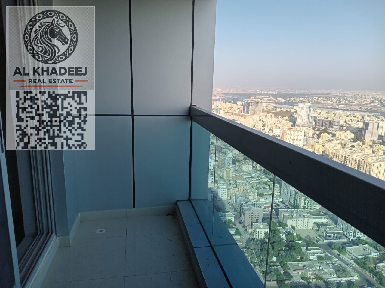 For sale in the Corniche Towers: a two-bedroom apartment with a living room and a maid's room, offering an open view directly overlooking the Corniche