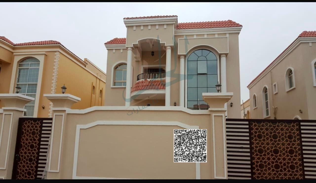 A spacious villa in a prime location in Al Rawda 2, just one minute from Sheikh Ammar Road, featuring a stone façade and generous outdoor areas