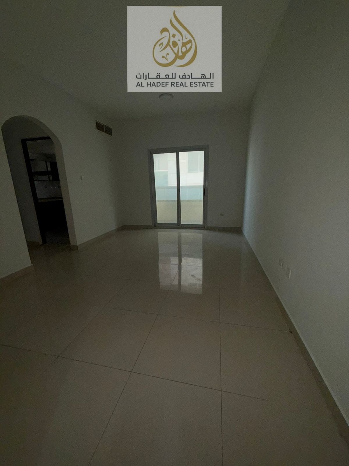 Annual rent in Ajman, Al Hamidiya area, behind Garden City Towers, near Ajman University. Two-bedroom apartment with a living room, central air condit