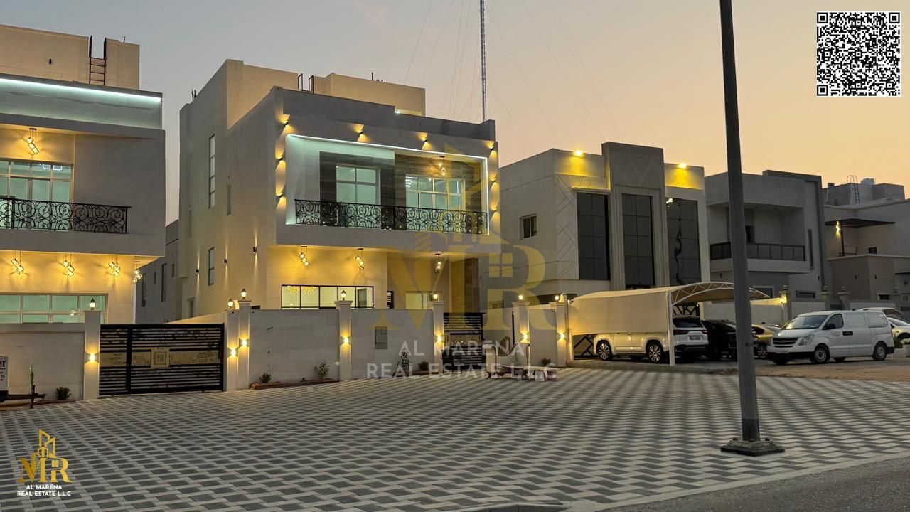 Near Emirates Crossing Street exit, villa with two floors and roof, 6 master bedrooms, price includes fees and AC, own it now in a prime location