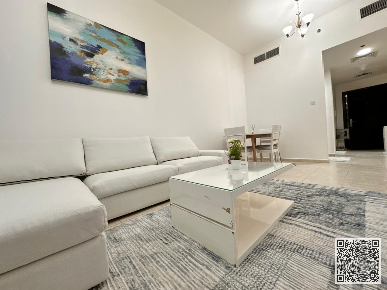 Luxurious one-bedroom apartment with brand new furnishings for monthly rent in Ajman - Corniche - near Diwan Roundabout