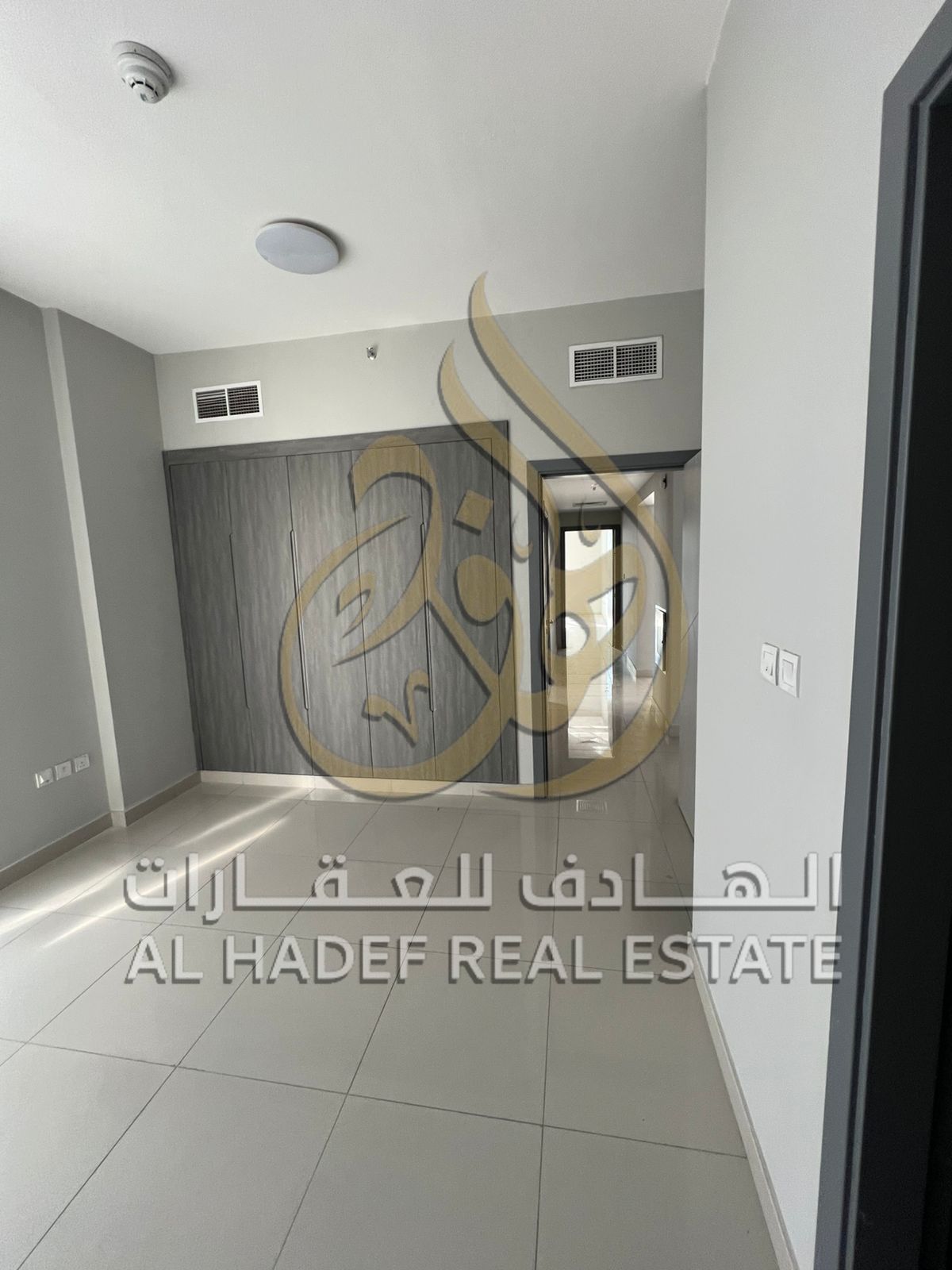Two-bedroom apartment with a living room, first occupancy, in the Khan area, with a storage room, balcony with a direct sea view, built-in wardrobes,