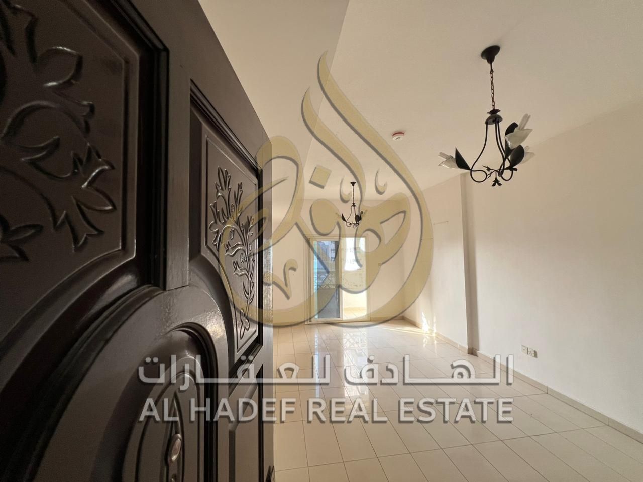 **Three-bedroom apartment with living room and maid’s room, featuring a balcony with open views, for annual rent in Sharjah, Al Taawun area, with free