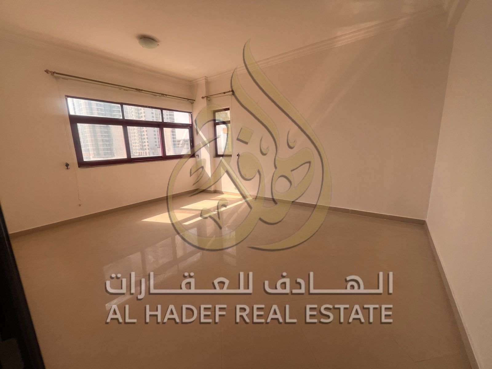 **Annual apartment for rent in Sharjah, Al Khan area: Two-bedroom apartment with living room, spacious layout, balcony, and flexible payment options. *