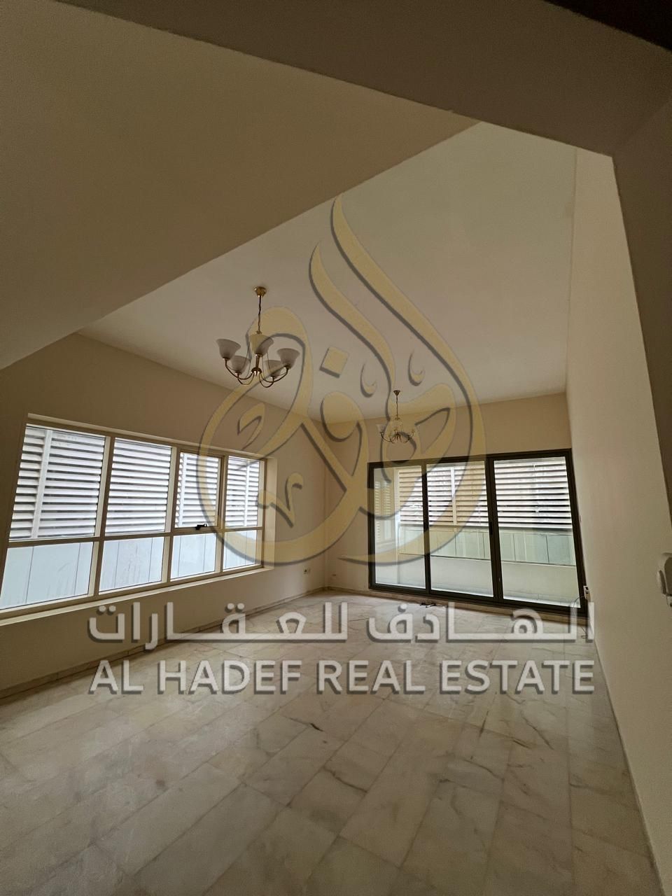 Two-bedroom apartment with a living room in Al Taawun – balcony and built-in wardrobes, family tower with CCTV surveillance, close to Dubai exit, for