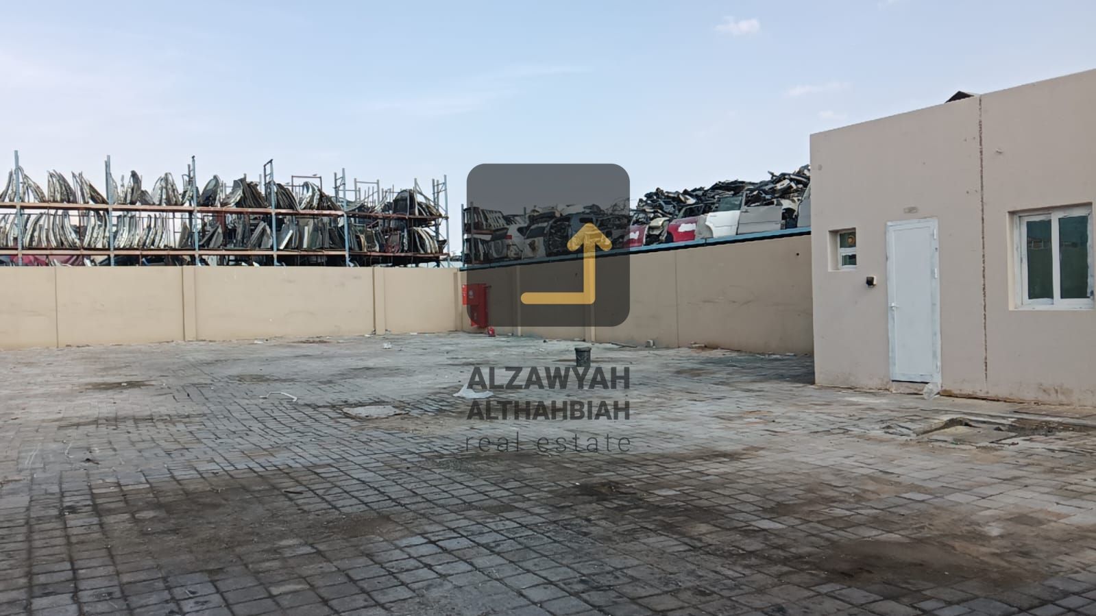 Investment Opportunity – Fenced Land on Two Roads | Al Sajaa Industrial
