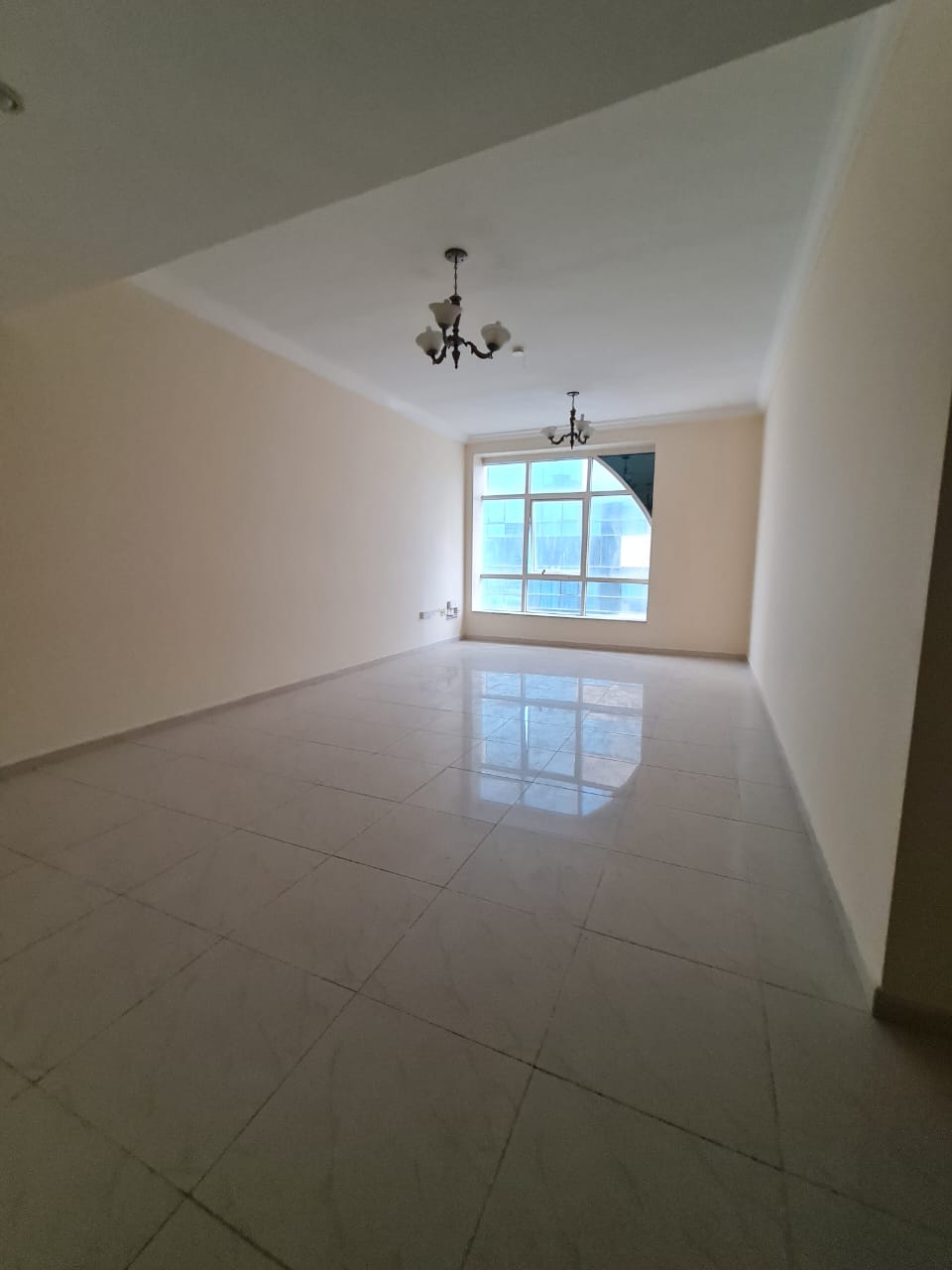 2-Bedroom Apartment with Maid Room for Rent in Al Qasba – Free Parking