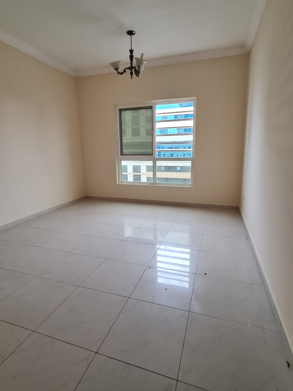 2 BHK in Al Qasba – Queen Tower Spacious layout with 2 bathrooms and free parking