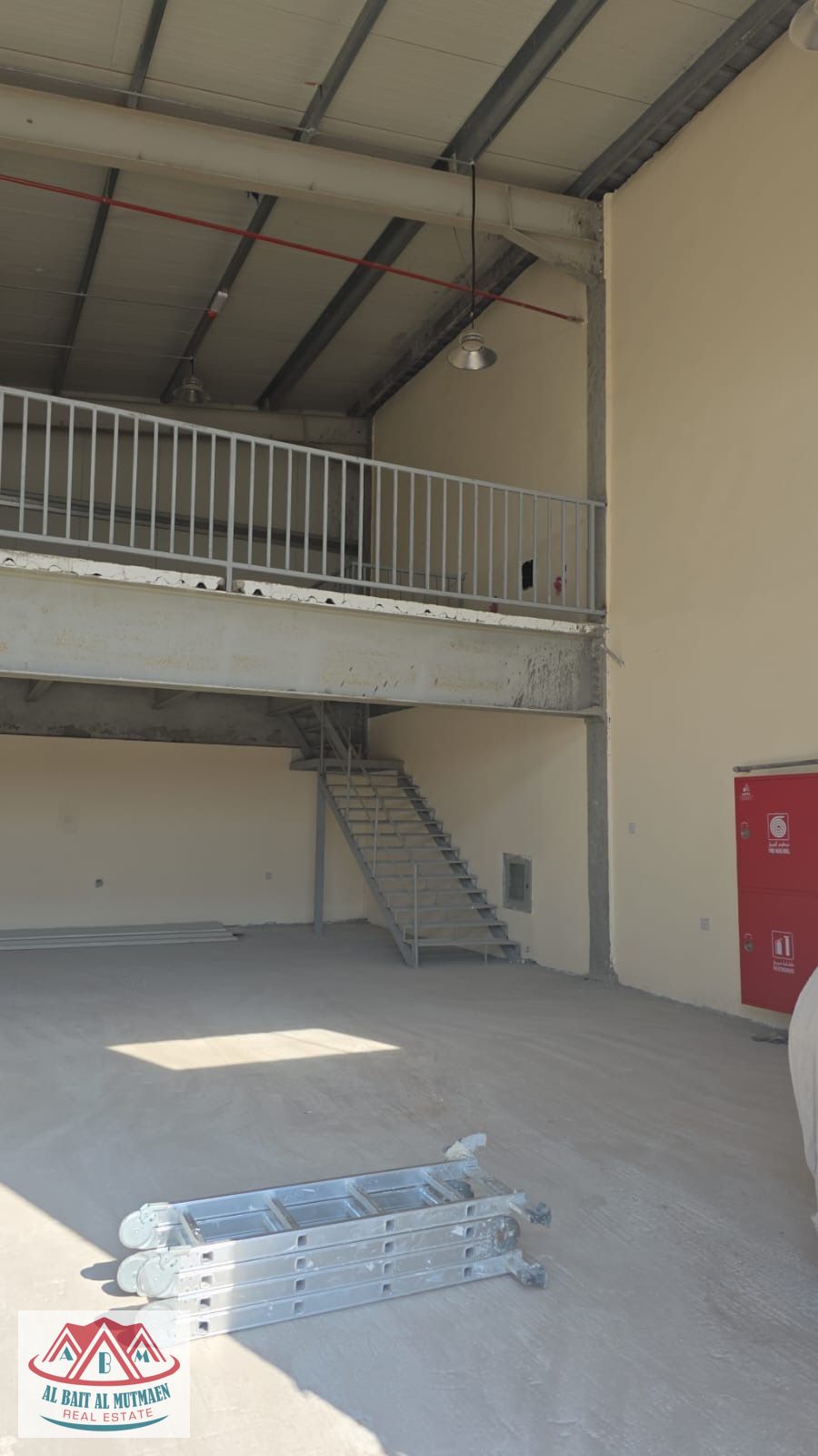Industrial building in Al Sajaa S, with storage and enclosure.
