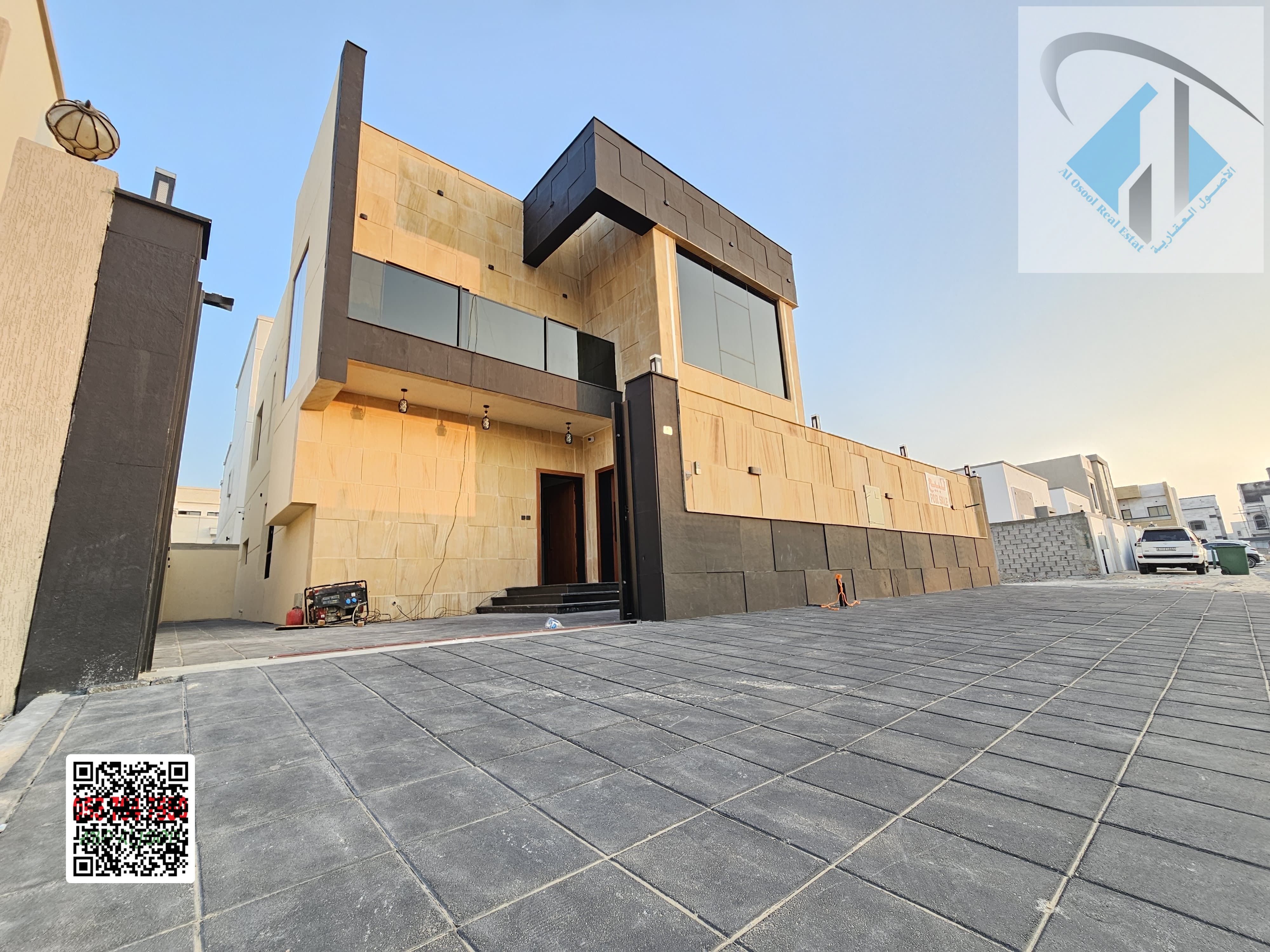 Villa for sale opposite Sheikh Mohammed Bin Zayed Road, prime location, freehold ownership, central air conditioning, negotiable price, no annual fees