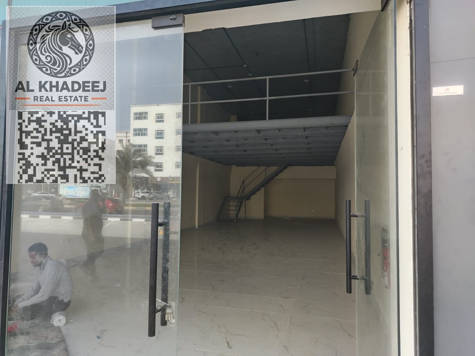 Large commercial shops for annual rent in Al Jurf 2 Ajman, first occupant, prime location near schools and services, suitable for major commercial