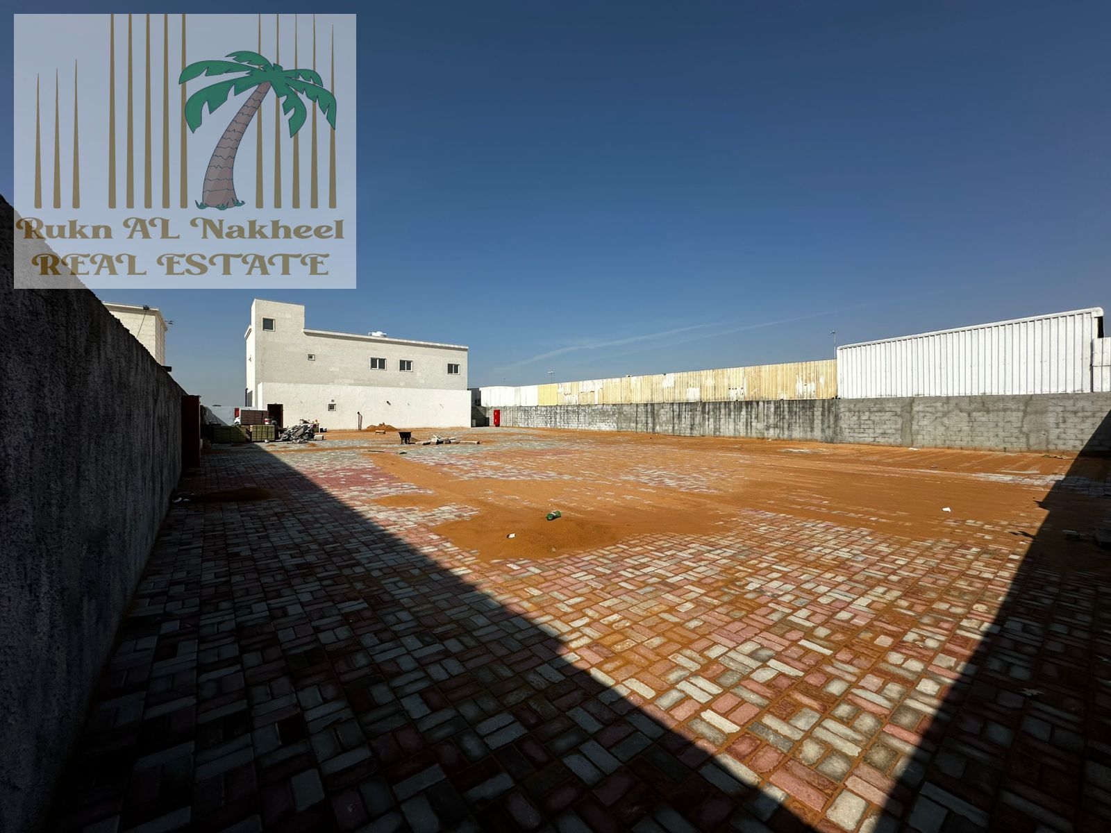 open yard/land for rent in al sajaa- ideal for storage and business.