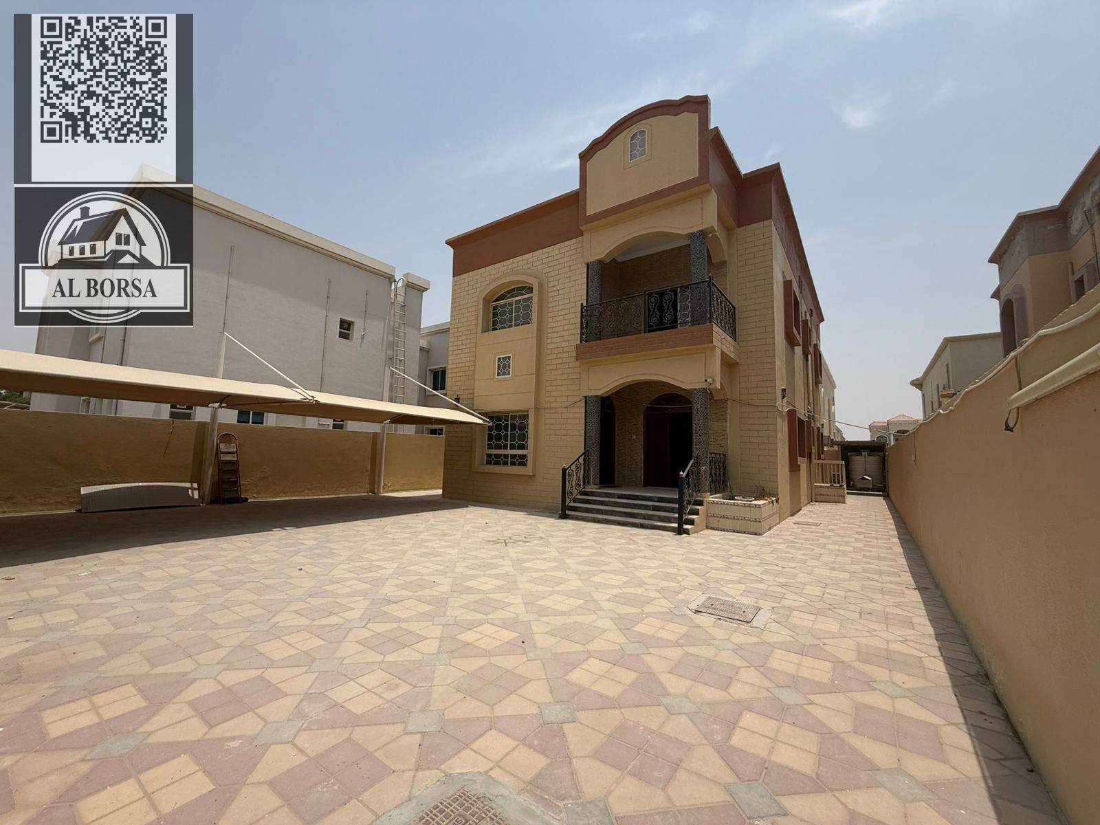 For rent a villa in Al RAWDA 2 in Ajman, 5 master bedrooms, a majlis, a hall, a maid's room, and a store