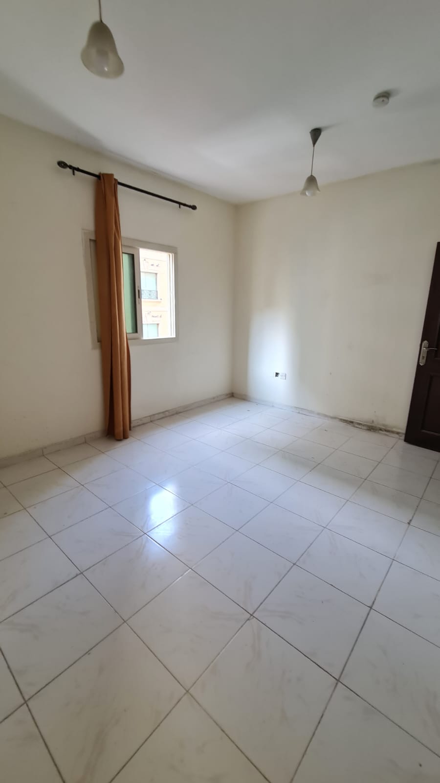 1BR apartment with living room for a small family in Al Qasimia, close to services.