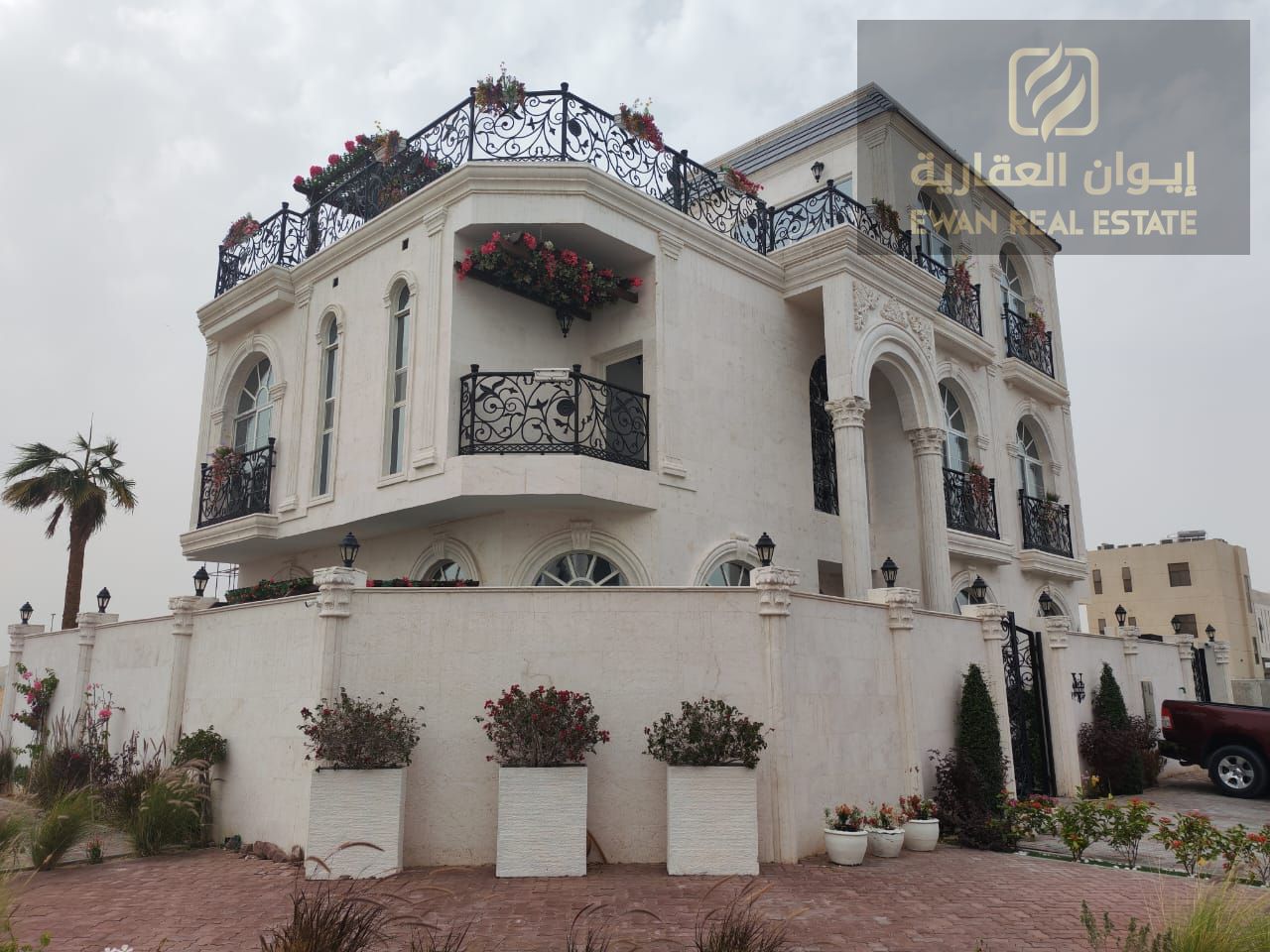 Villa for sale in Al Bahia with a private pool, five master bedrooms, outdoor seating areas, and a rooftop terrace. A luxurious villa with a distincti
