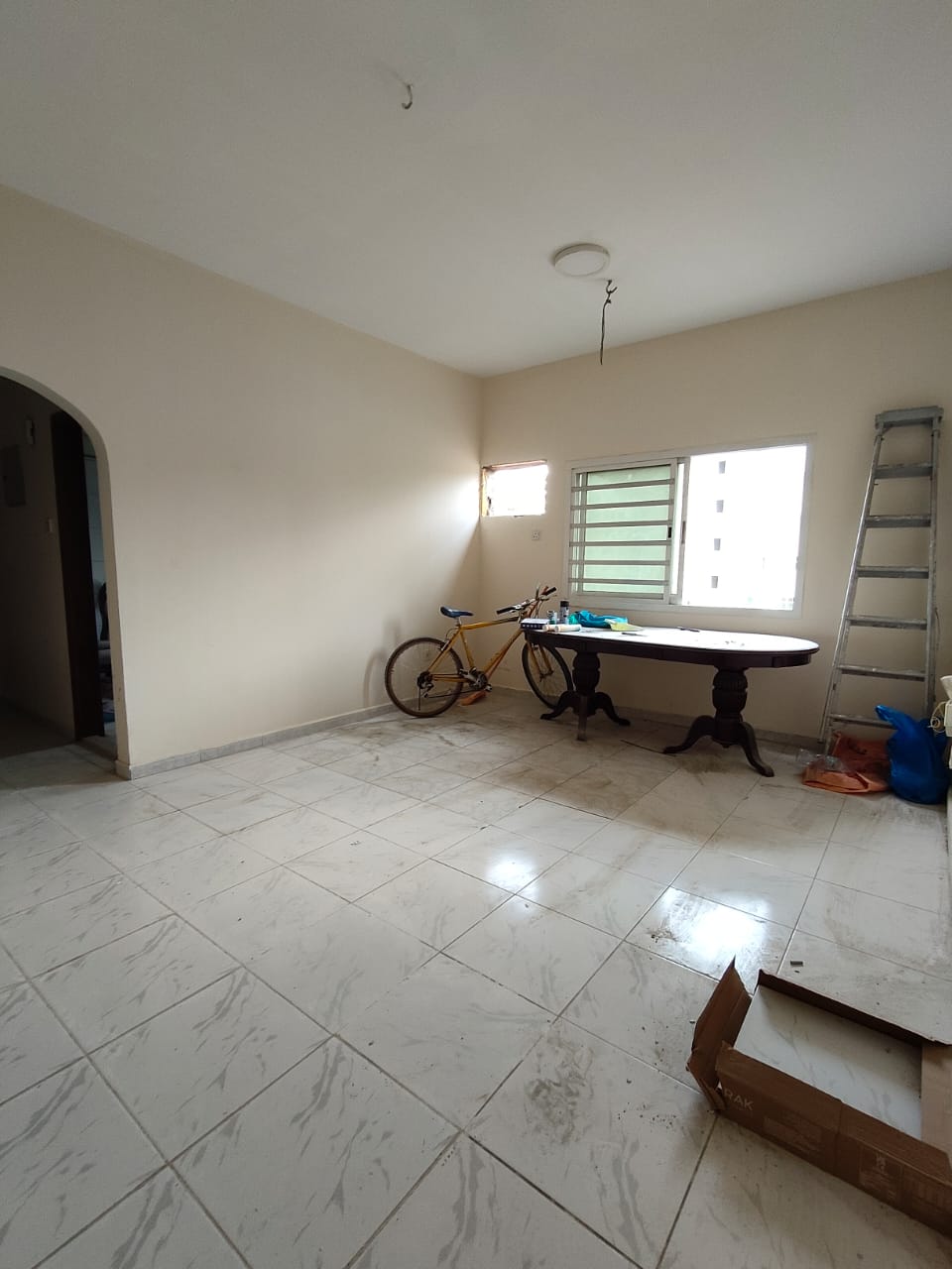 A distinguished one-bedroom apartment with a spacious living room at a special price in Al Butina, near Zulekha Hospital.