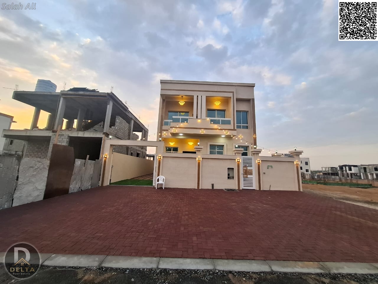Villa for sale in Al-Haliyo 2, including registration fees and ownership, prime location on a main street.