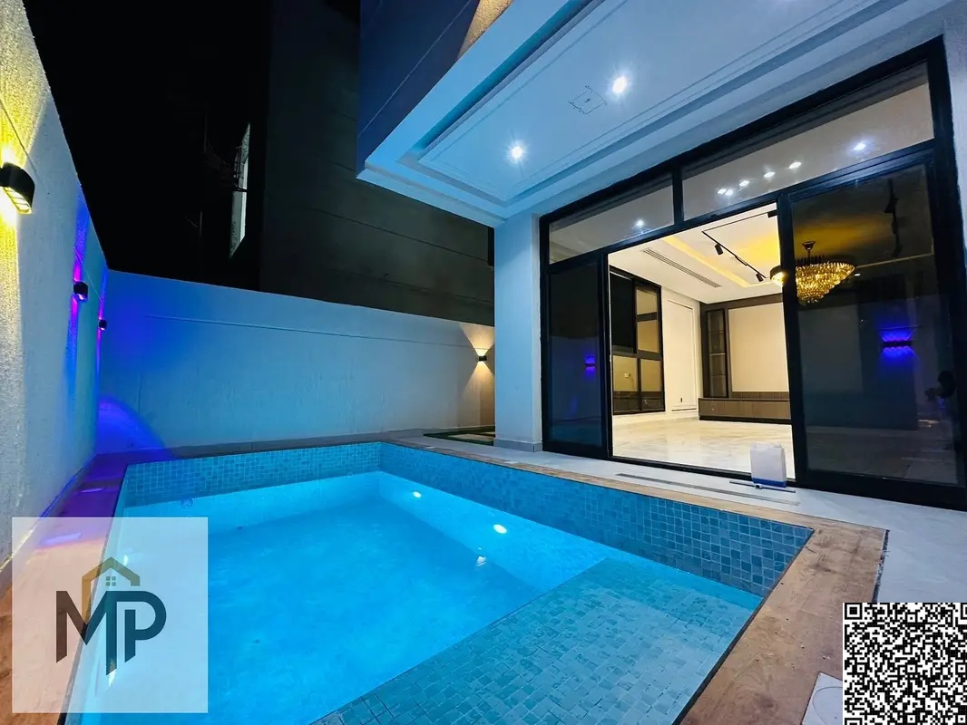 Own a villa with a private pool, including registration and ownership fees in Ajman, first occupant, with lifetime ownership and inheritance.