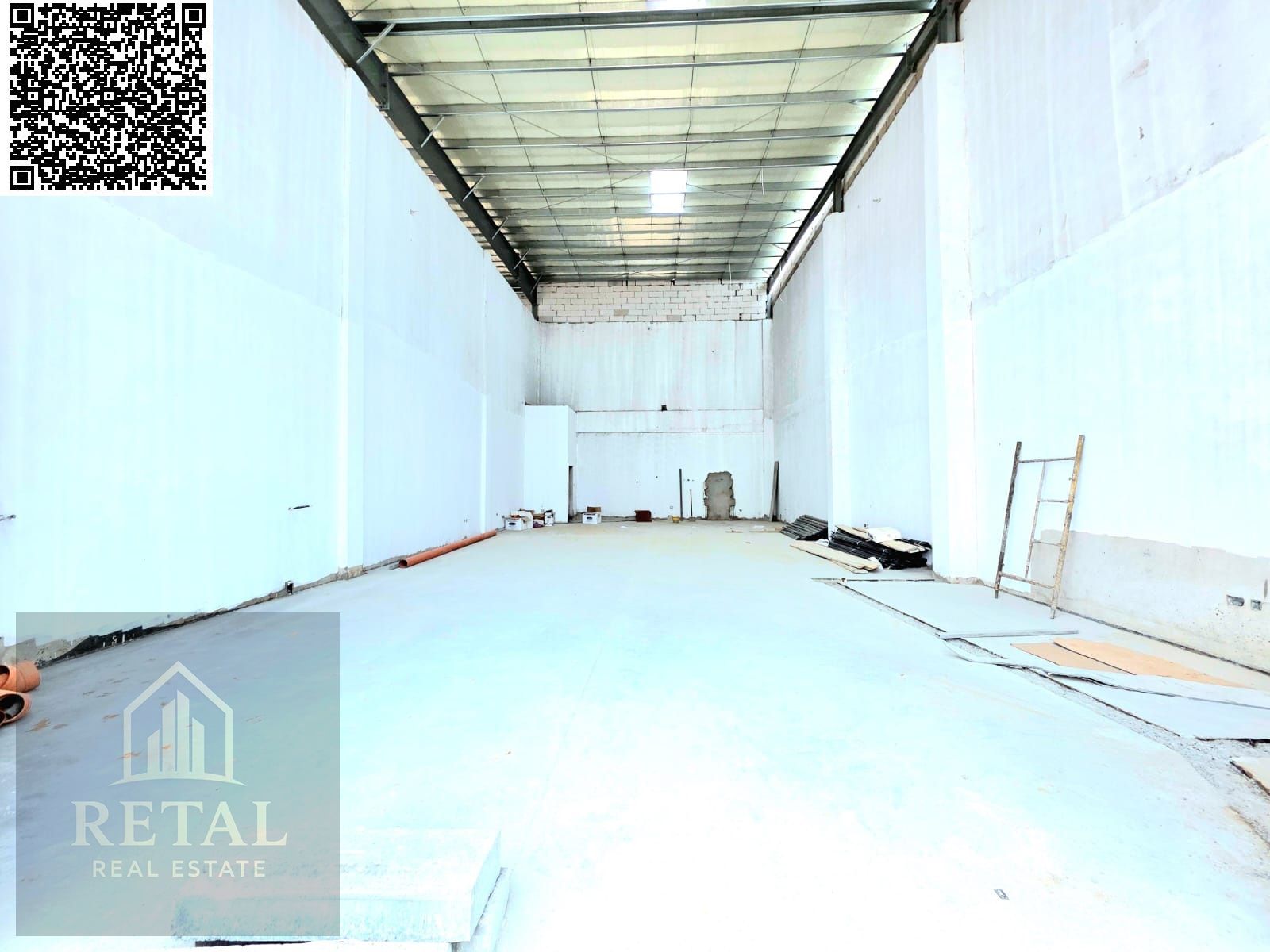Lowest price for a new warehouse on a main street, one flat area.