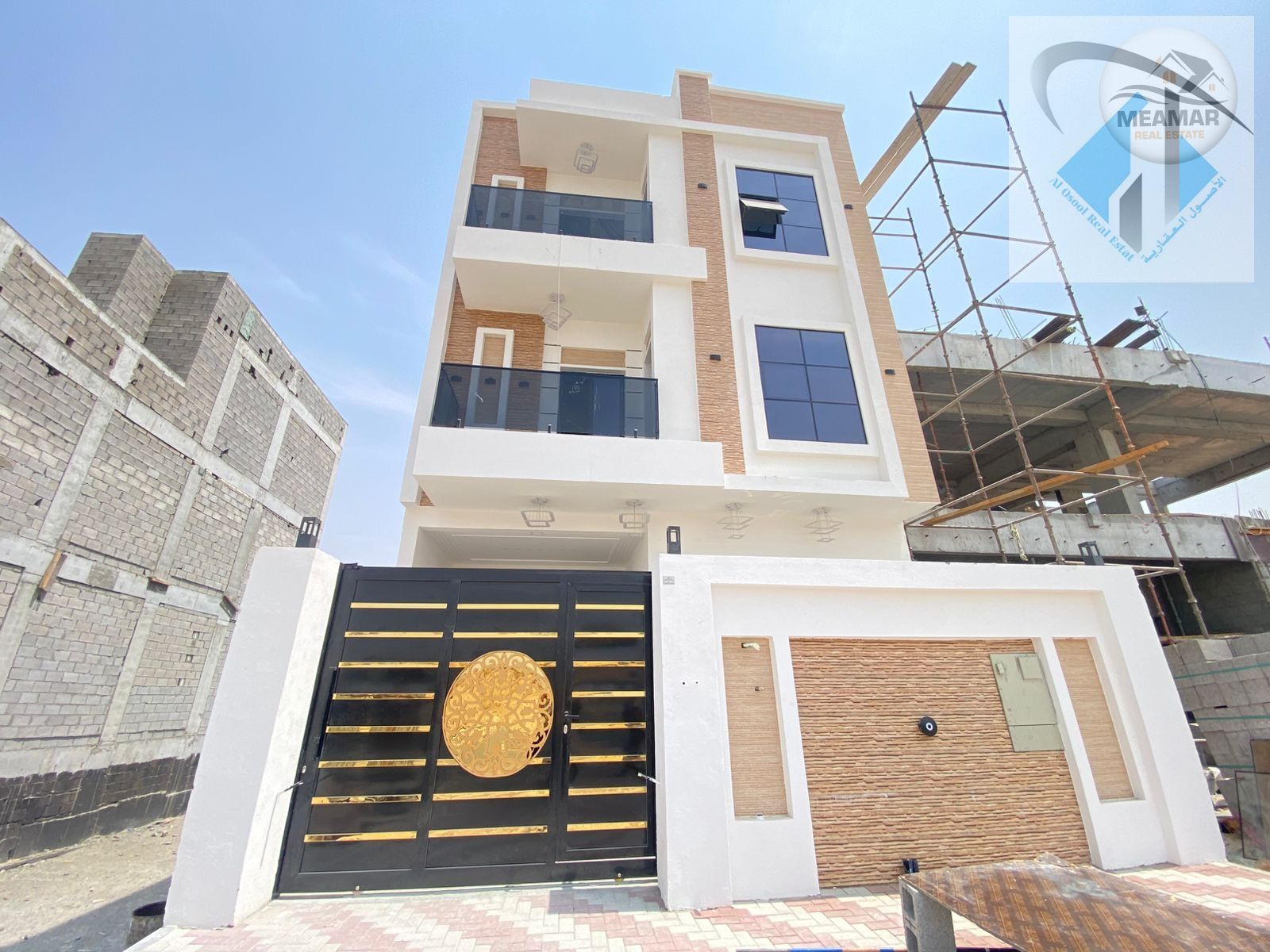 Excellent house with two living rooms and a roof in Al Yasmin, including fees and air conditioning, with an excellent building area, freehold ownershi