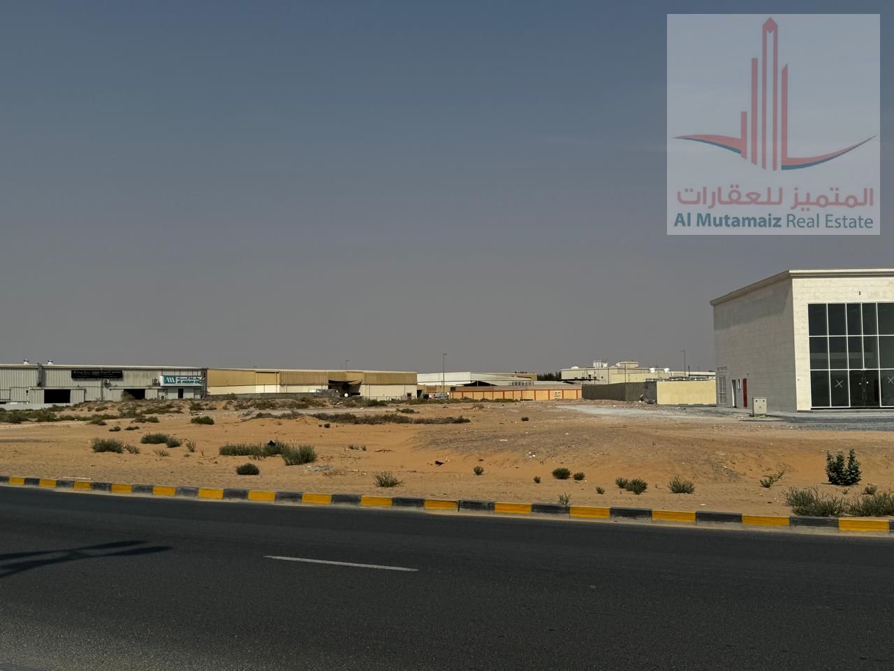 Direct from Owner: Prime Commercial–Industrial Land for Sale in Al Sajaa on Main Road Directly Facing Tasheel Roundabout – Strategic Investment Locati