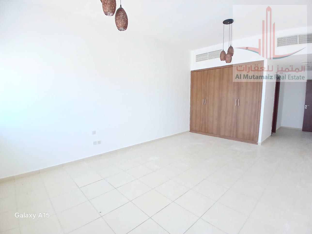 Two bedrooms and a living room in Ajman One for sale. Excellent location in the city center. Includes three bathrooms. Special price, negotiable.