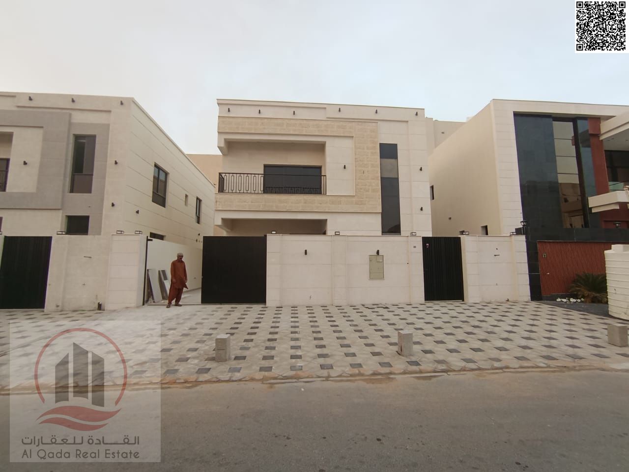 Villa for sale in Ajman, Al Bahia area. 5 bedrooms, living room, and majlis. Registration fees included. Elegant design in a prime location.