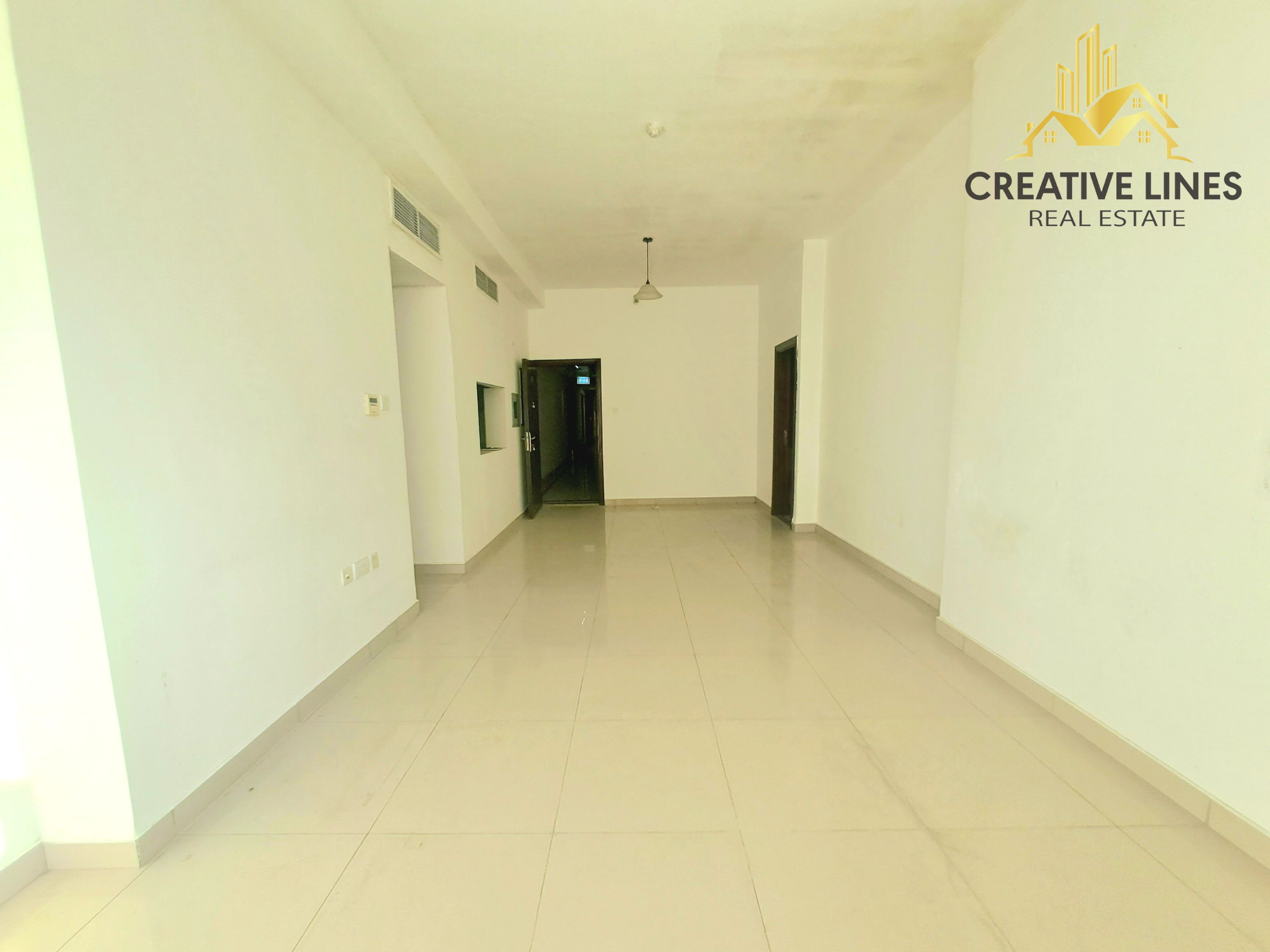 “Bright 2BHK with Balcony Near RTA Bus Stops — Prime Location”