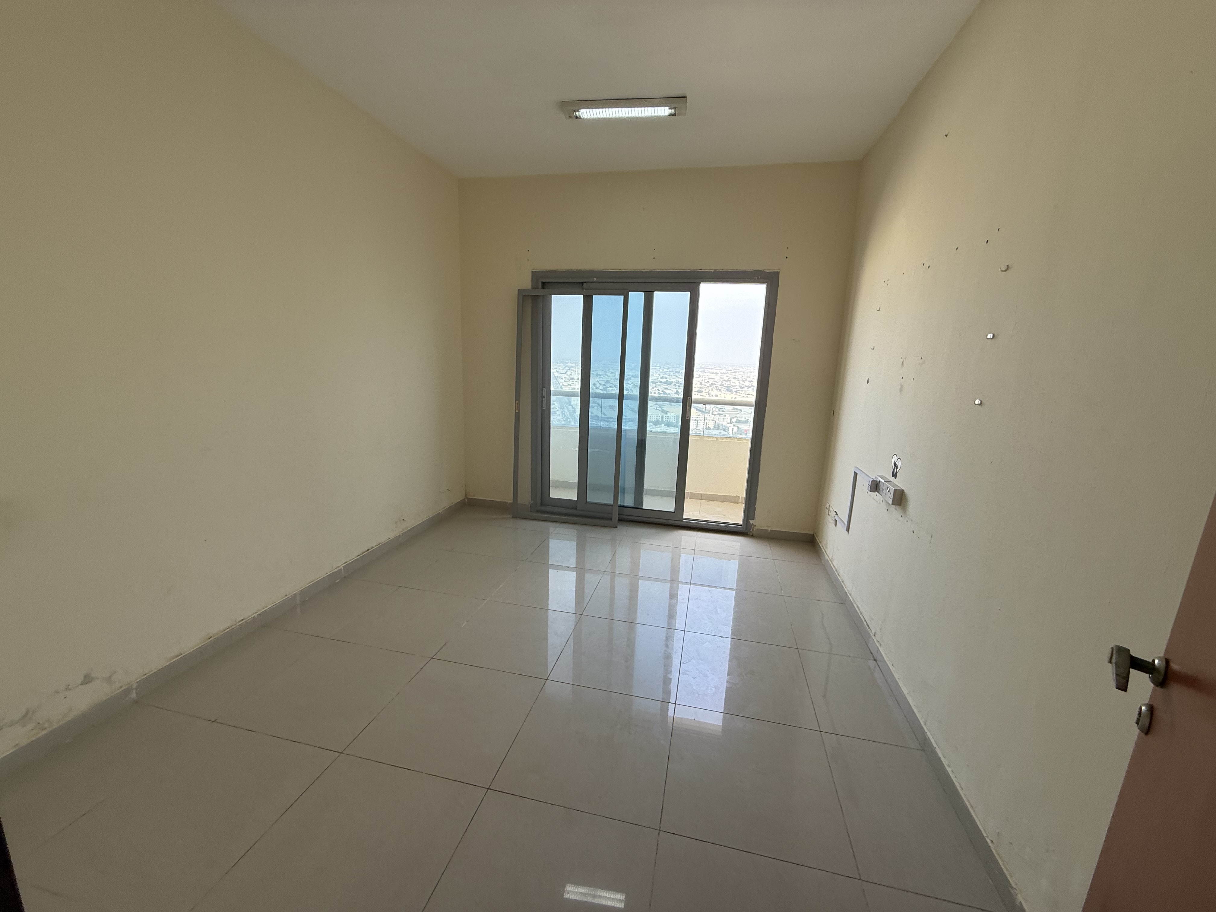 DUBAI BORDER WITH BALCONY 1BHK AVAILABLE AL NAHDA