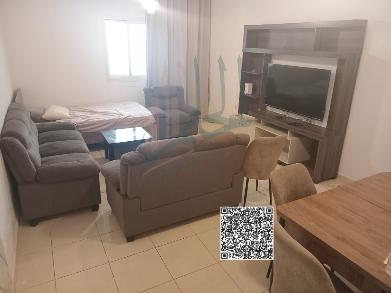 For Sale – Premium Apartment in Orient Towers, Ajman A luxurious apartment with two bedrooms, a living room, two bathrooms, a kitchen, and a balcony,