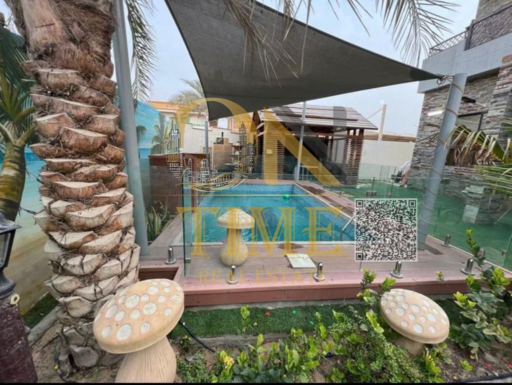 Two-story villa for sale in Ajman - Al Rawda 3 | Swimming pool with American filters | Parking | Garden |