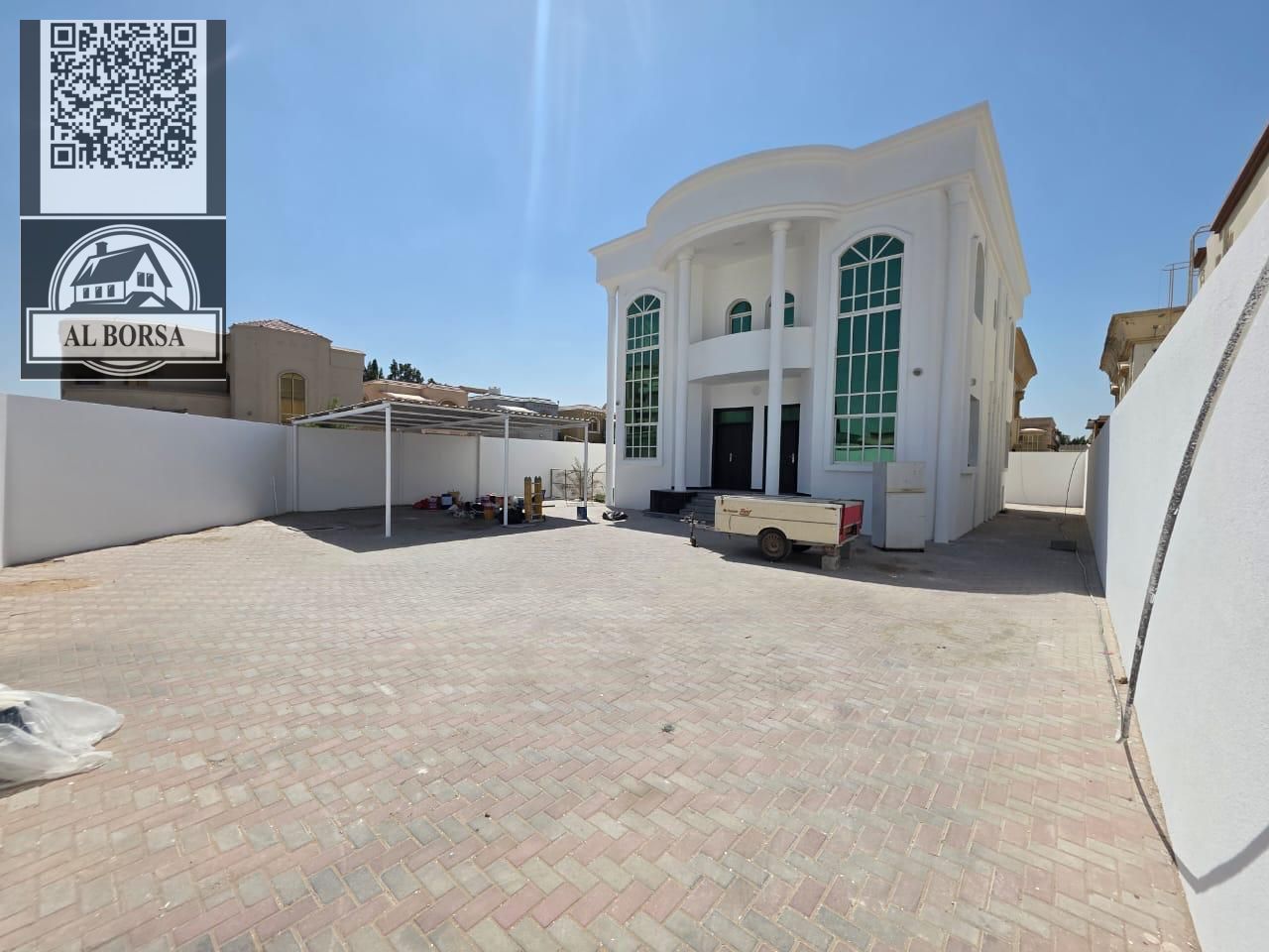 For rent a villa in Al RAWDA 2 in Ajman, 6 master bedrooms, a majlis, a hall, a maid's room, and a store